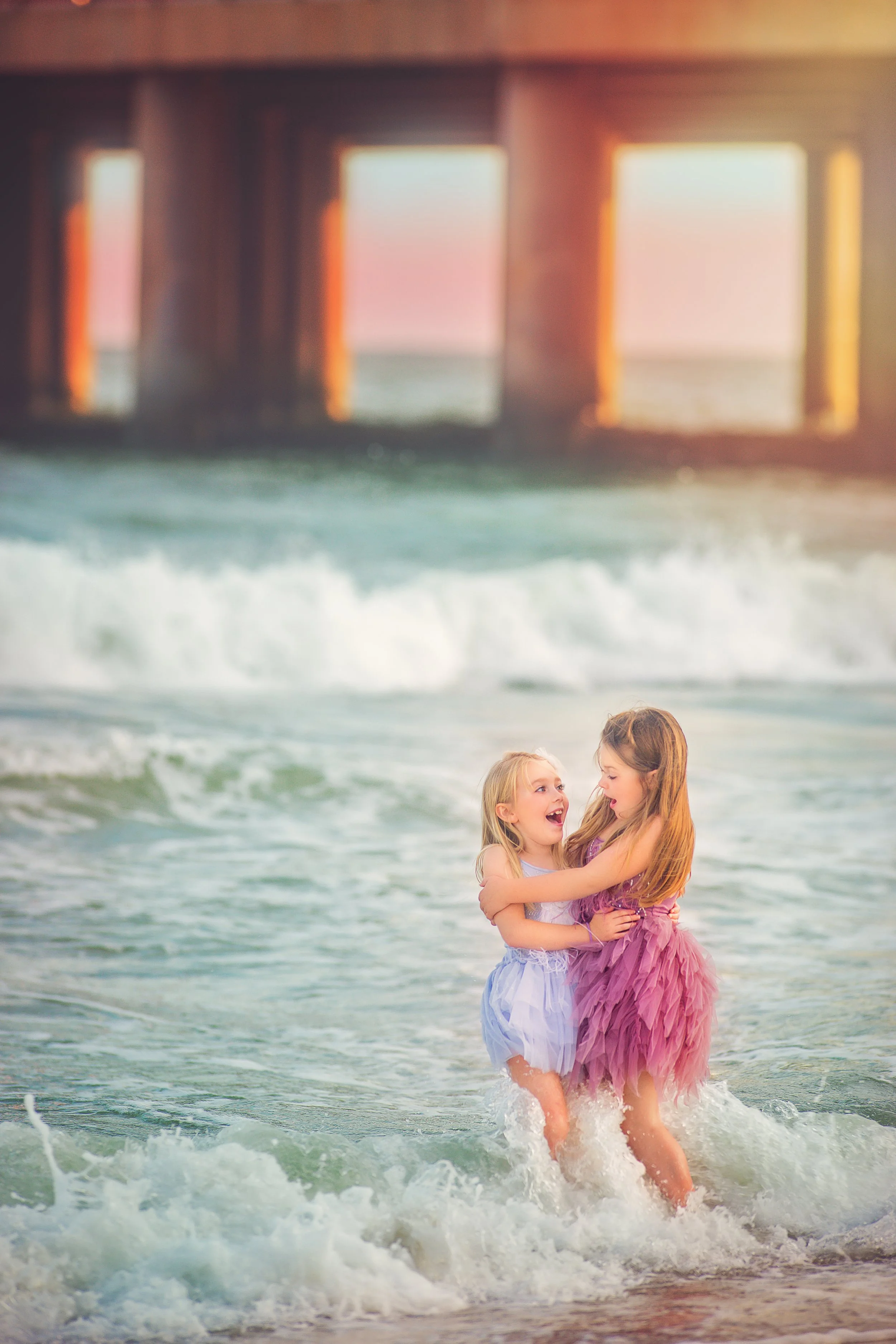 Siblings standing close together on the beach during a Jersey Shore portrait session