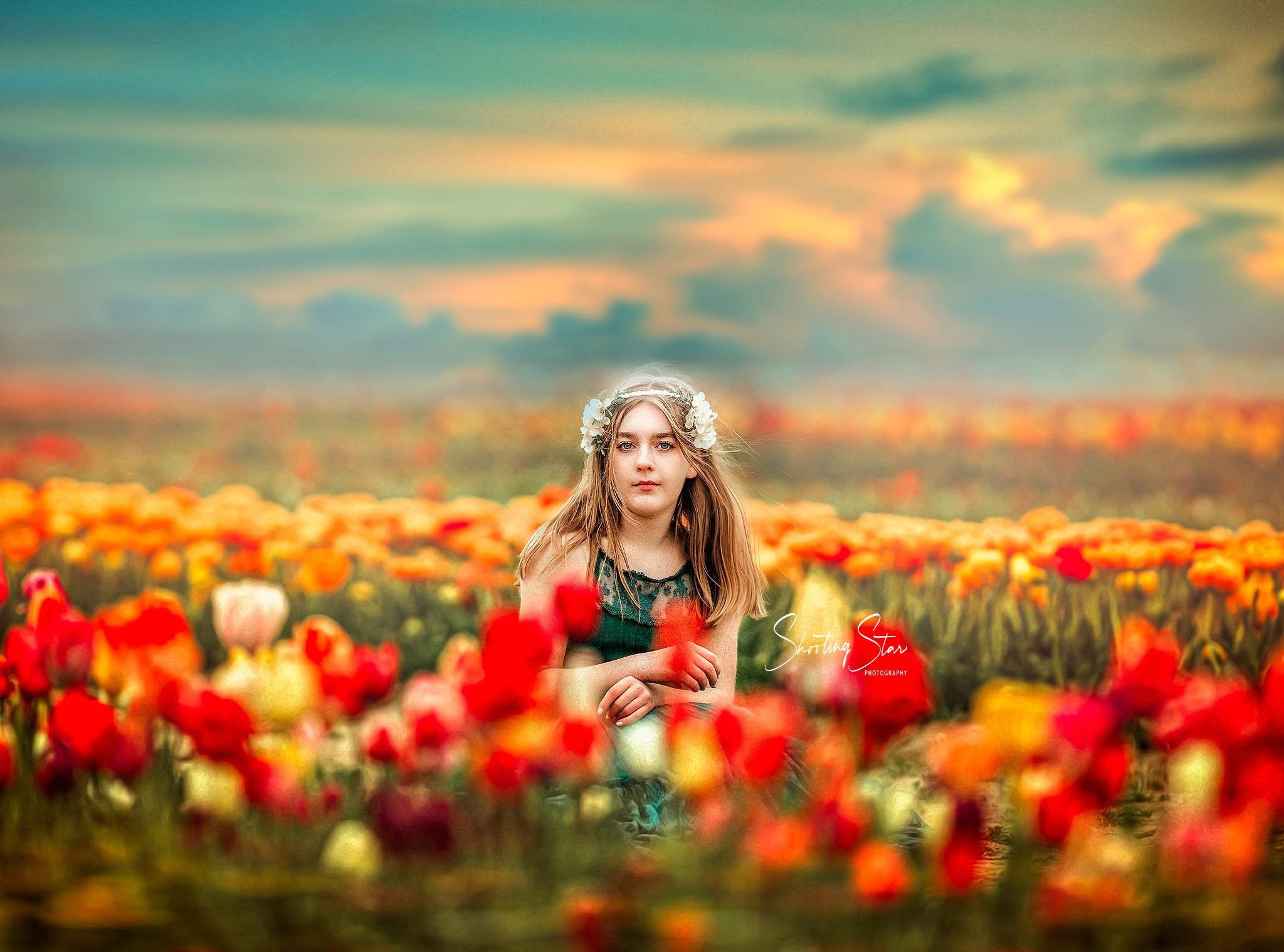 Girl sitting in tulips at Dalton Farms in South Jersey during a spring portrait session