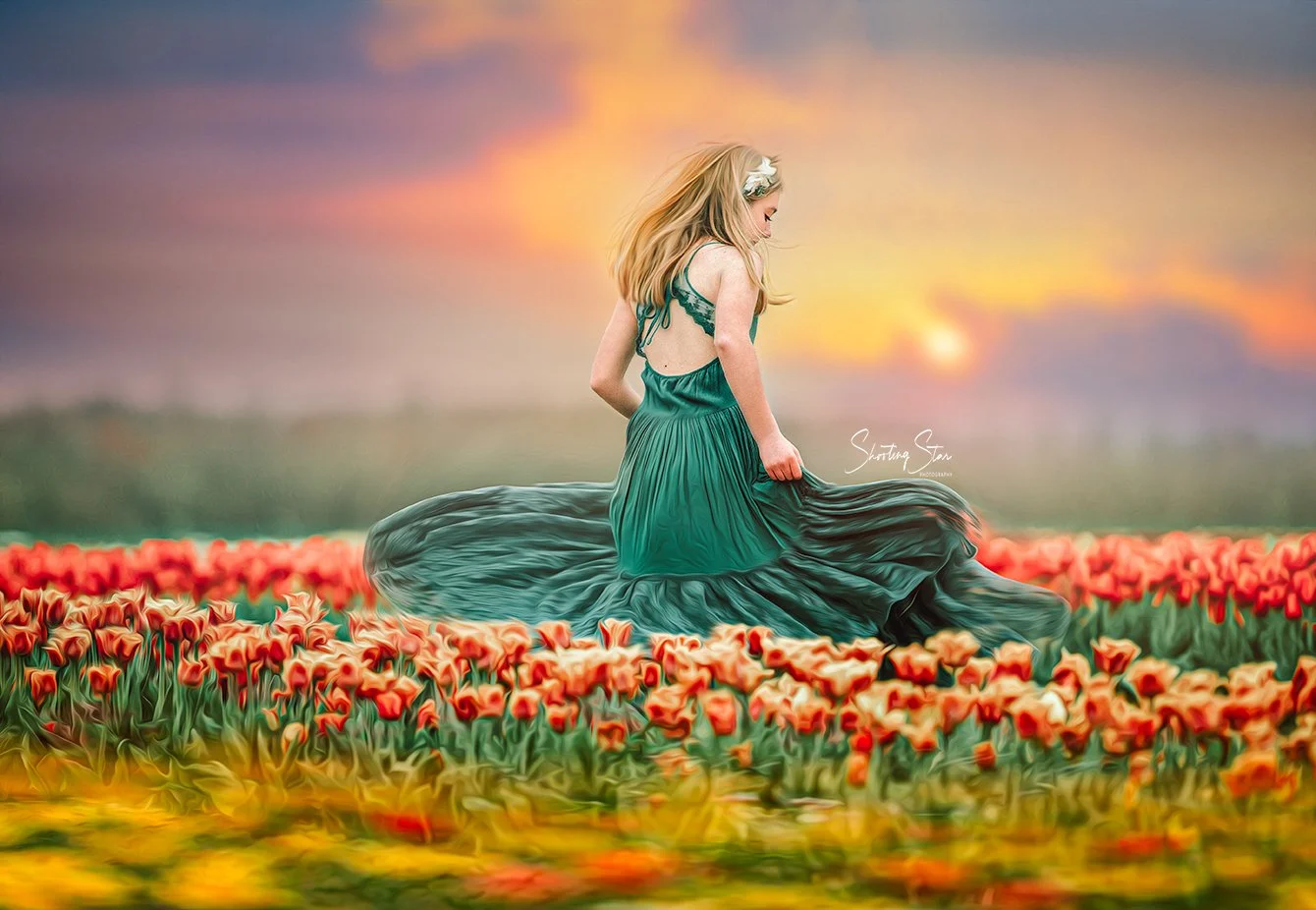 A golden-haired teen twirls gracefully in a flowing green dress at Dalton Farms in Swedesboro, NJ, surrounded by vibrant blooms and dreamy sunlight.