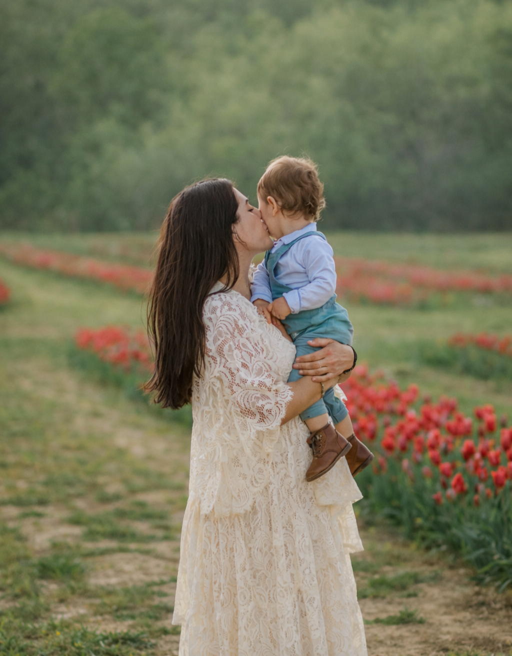 Mother and son photographed in blooming tulips during a South Jersey spring session.