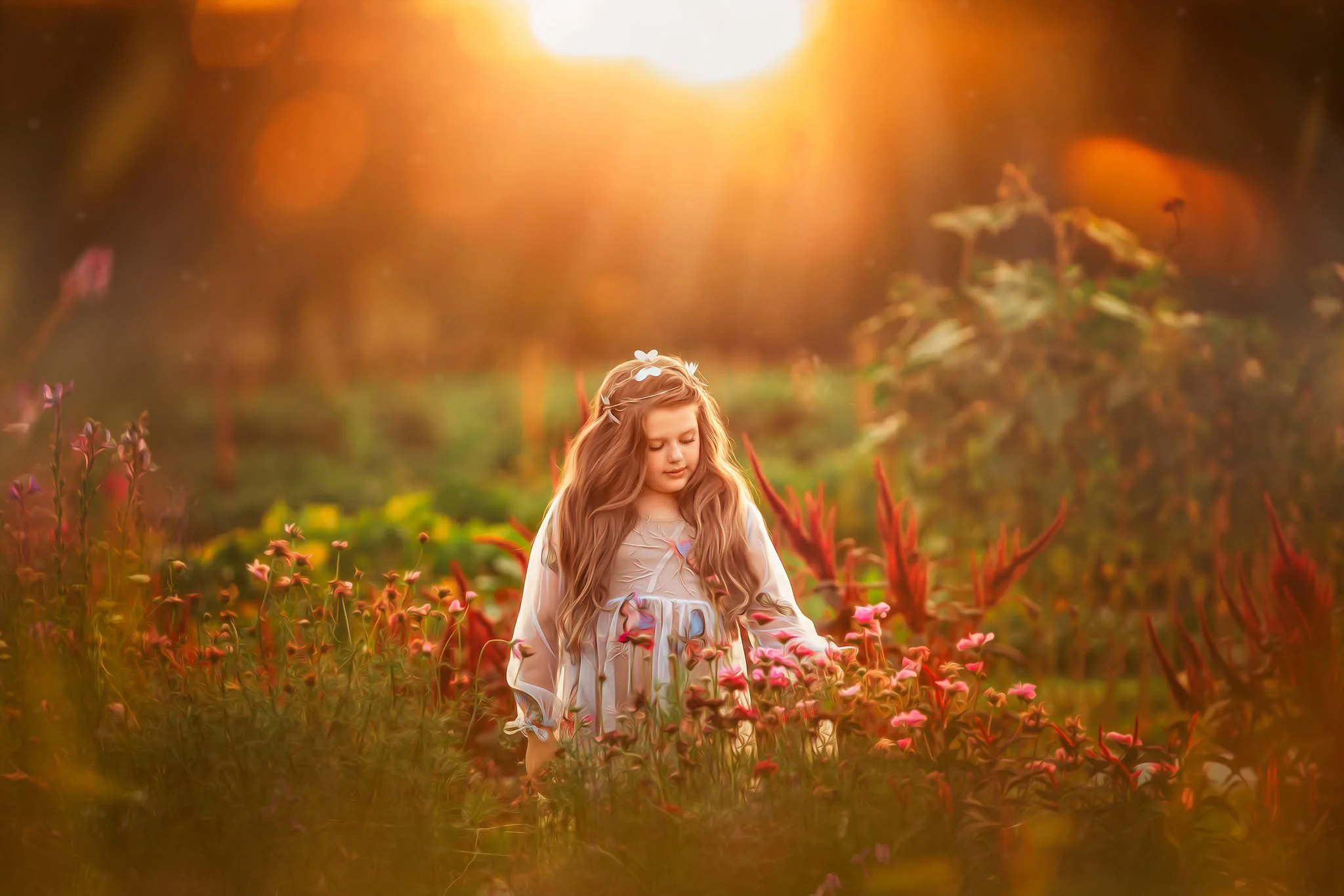 A girl in a wildflower field in Woodstown, NJ, captured during a dreamy and magical portrait session by a NJ photographer.