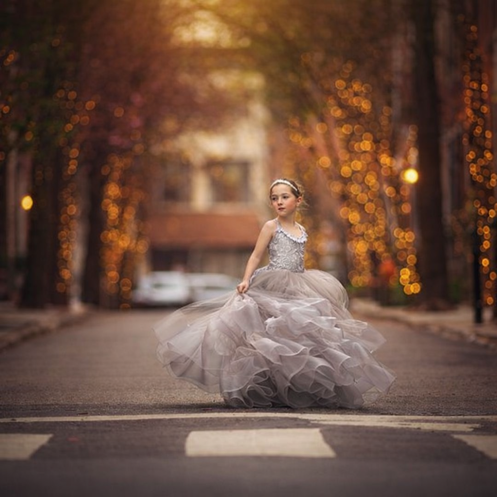 girl in princess couture dress in Philadelphia twirling in Rittenhouse