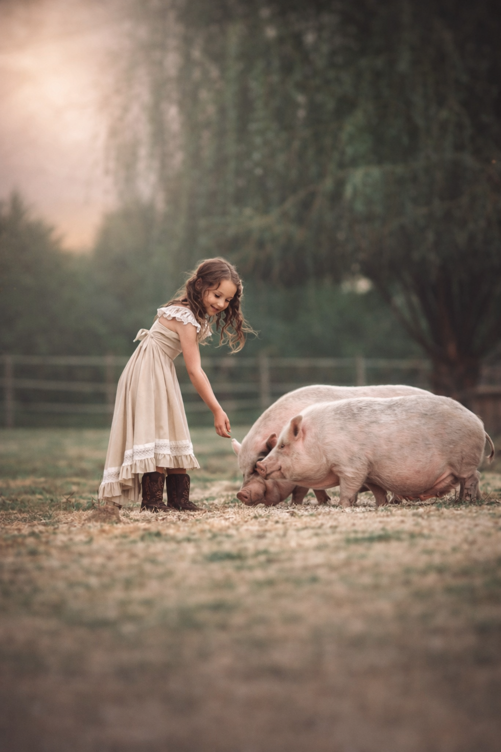 Whimsical farm portrait of a young girl gently interacting with a pig in a South Jersey pasture, photographed in soft natural light with a timeless feel.