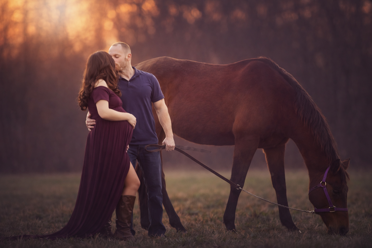 Pregnant mother standing with horse during fine art maternity session in South Jersey field