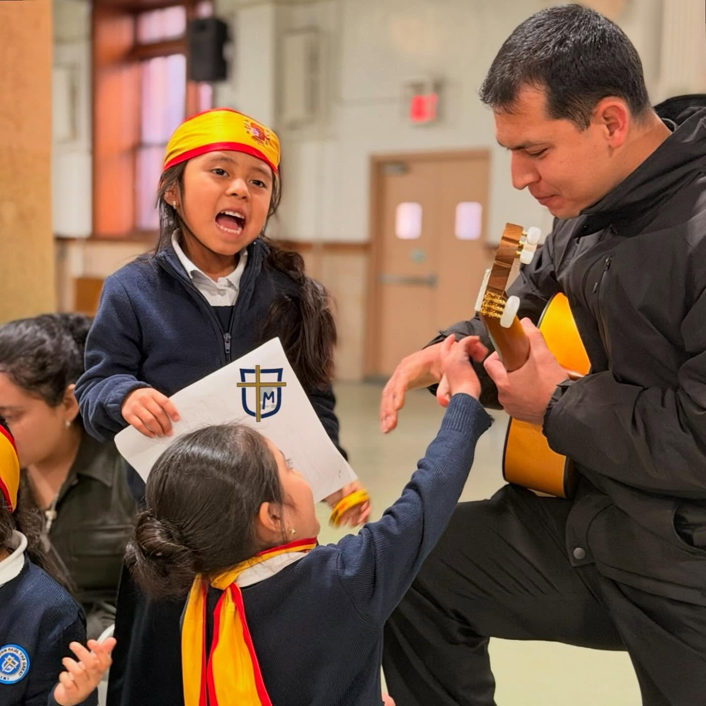 During CSW Floral Games, Team Spain is preparing for the singing portion of the competition! #catholicschoolsweek2026 #nyccatholicschool