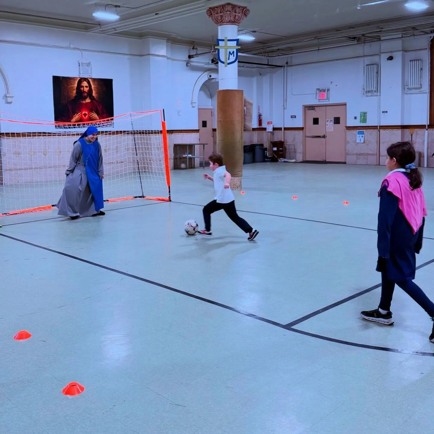 Once a week at our after school program we have a soccer coach that comes to teach the children. Indoor or outdoor they have a blast. Pictured here is our star goalie! #nyccatholicschool