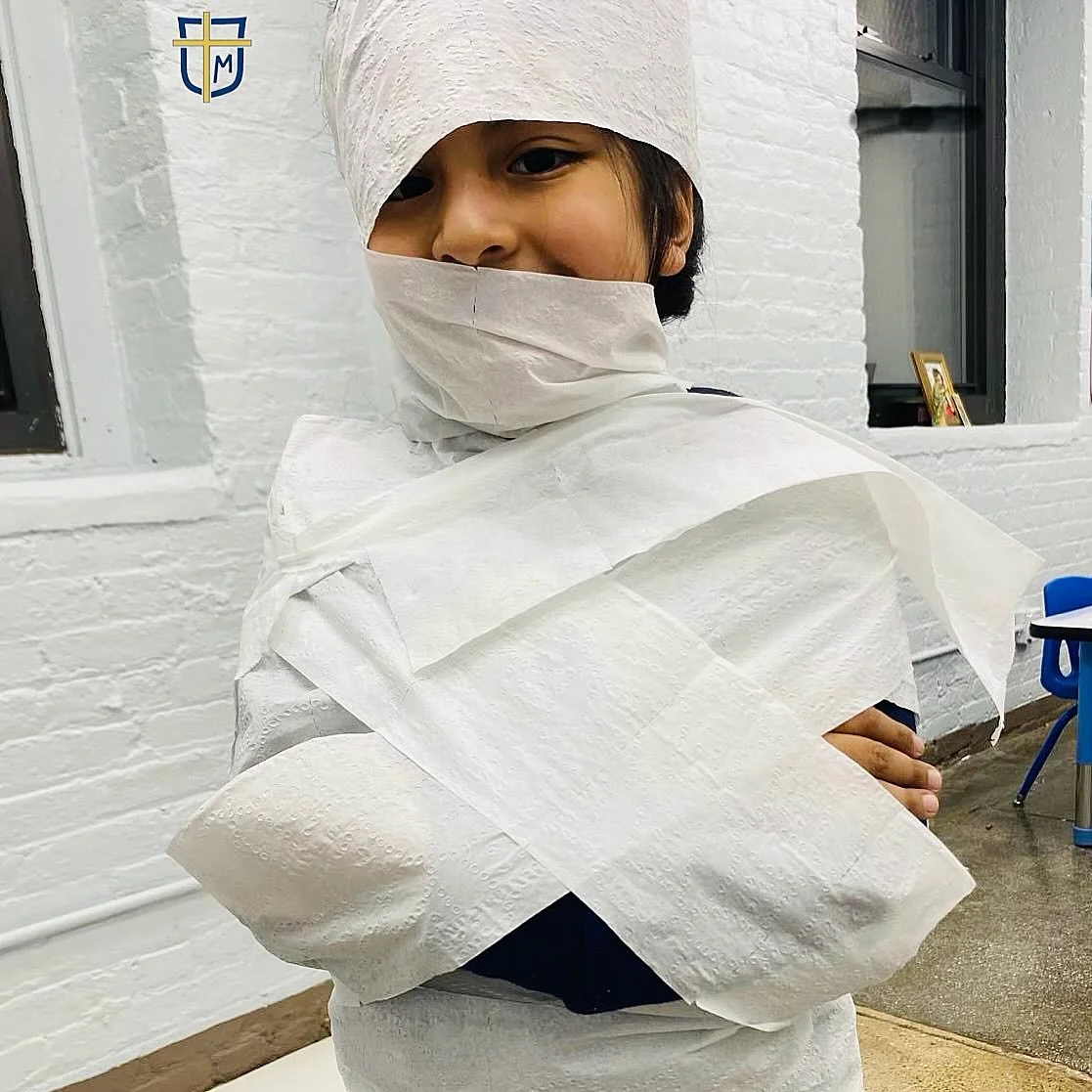Kindergarten fun - first they built pyramids, then they mummified their classmates! #classicaleducation #nyccatholicschool