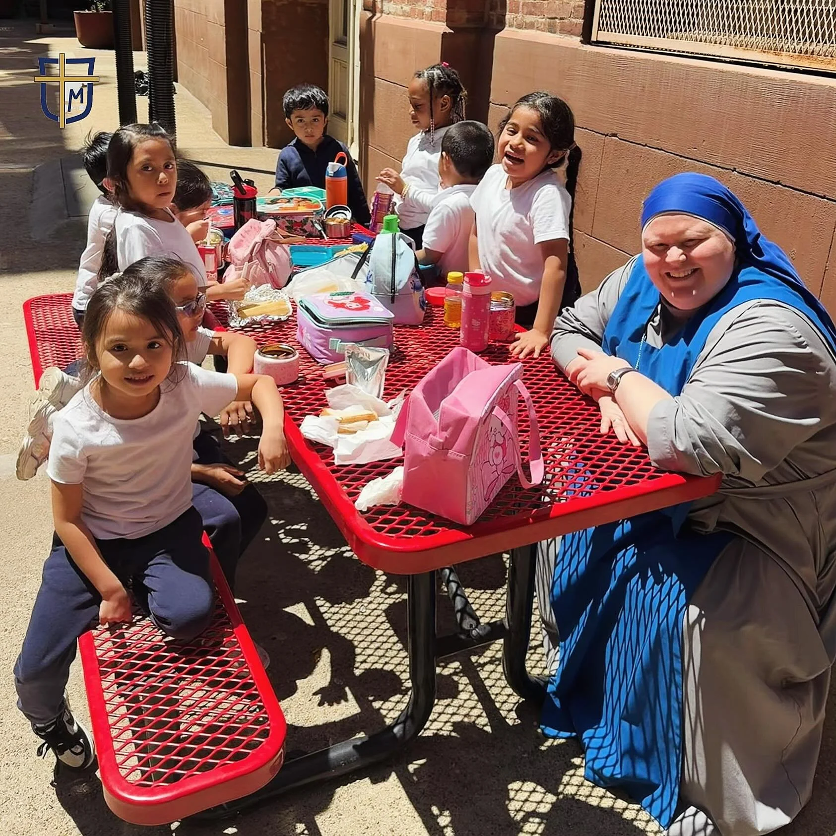 Happy Friday! Eating our lunch in the sunny courtyard. Have a blessed weekend everyone! #nyccatholicschool