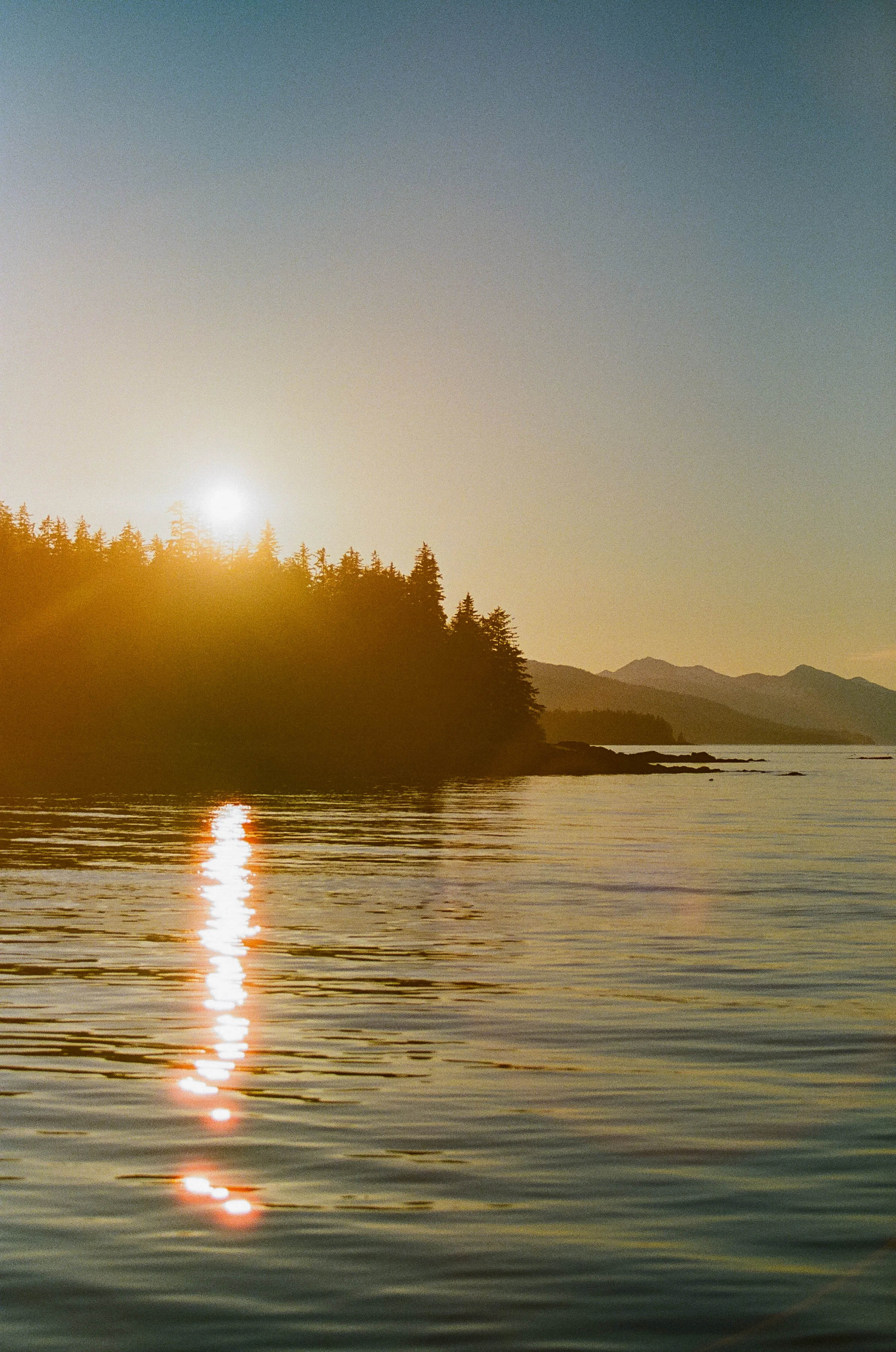 Landscape image of sunset over the inside passage in southeast Alaska