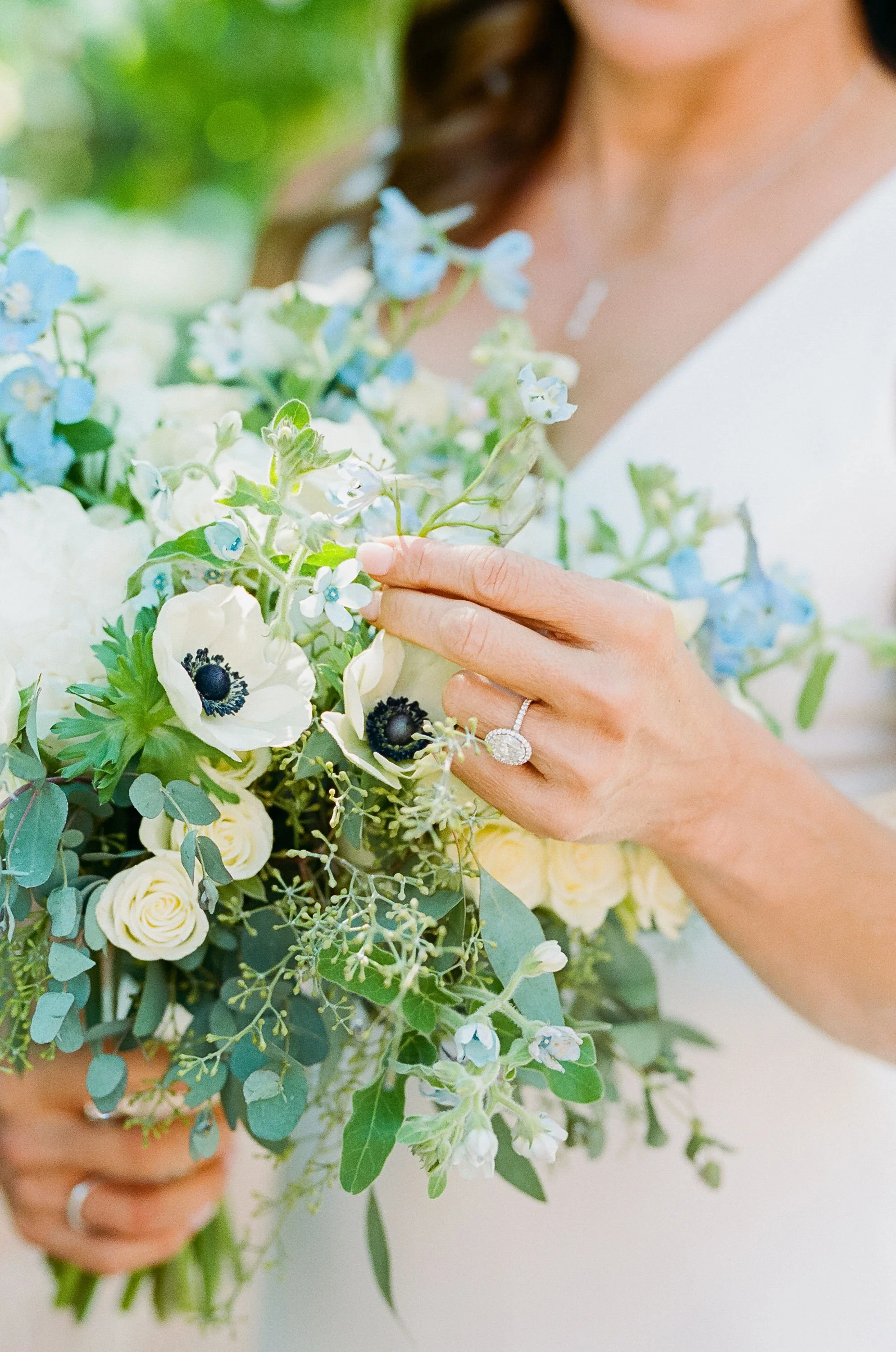 Alaska bridal bouquet with white and blue flowers