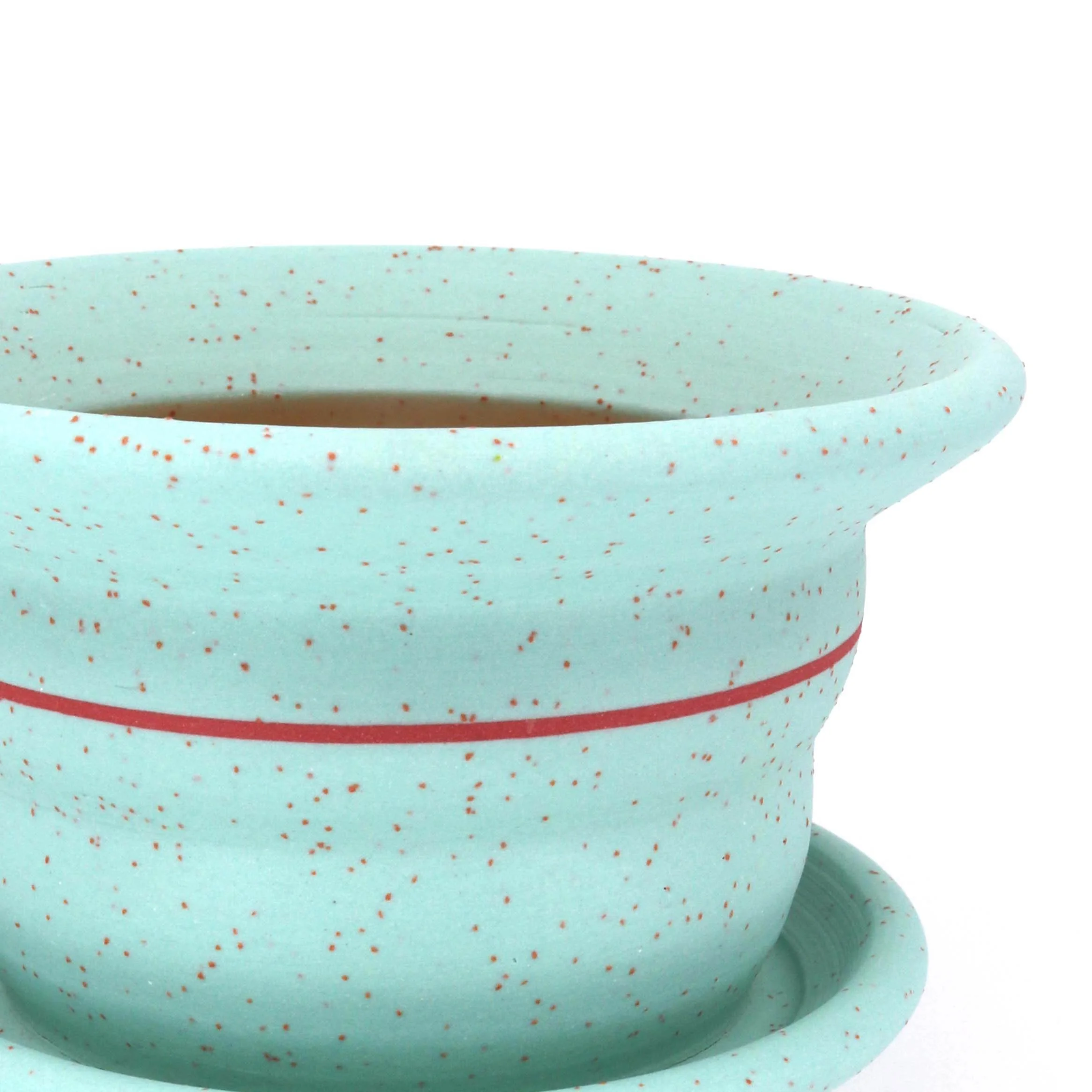 Fruit Punch S wedged into stained porcelain. 