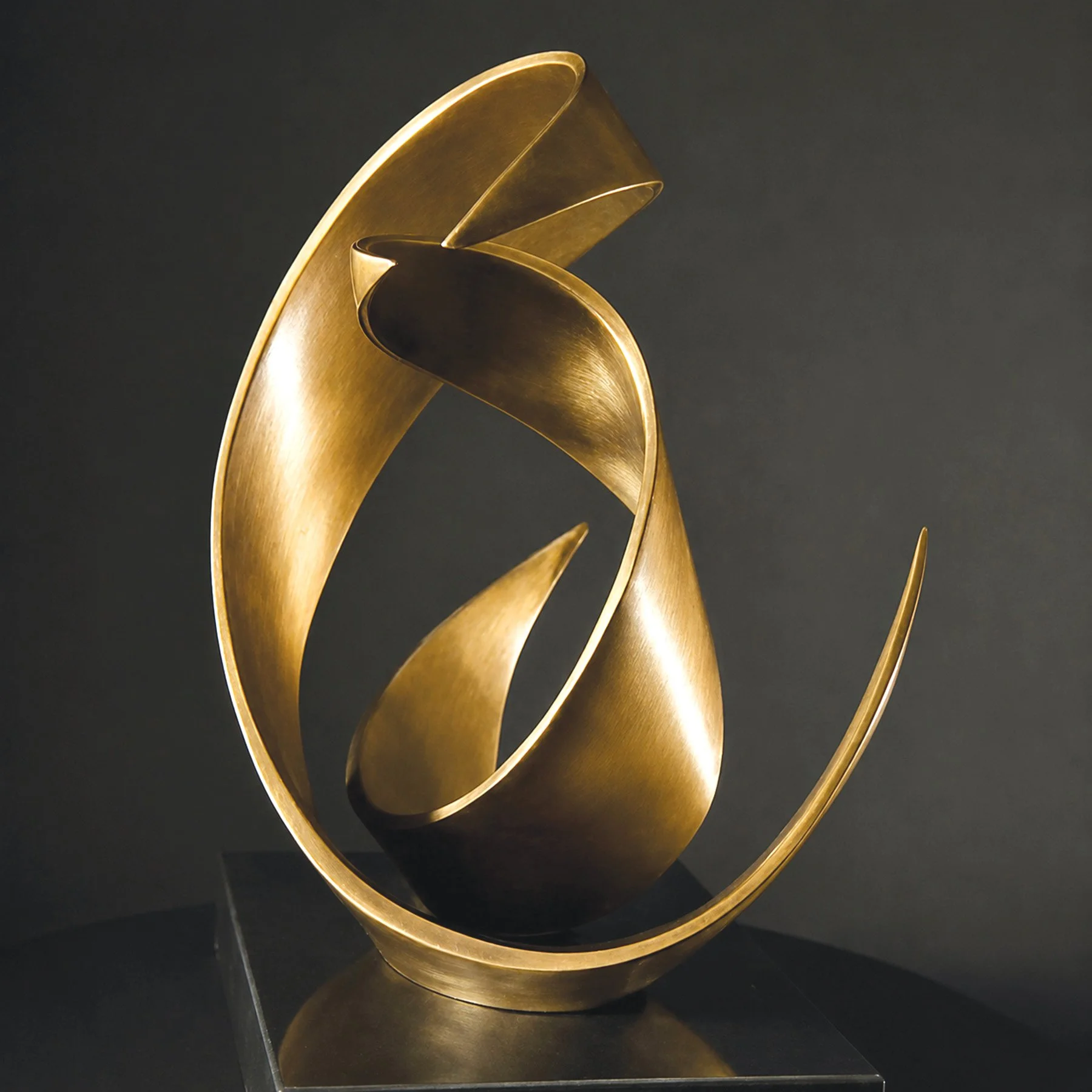 Lynn Dodge l Momentum V l Bronze with black granite base l 11” x 9.5” x 6/5” 