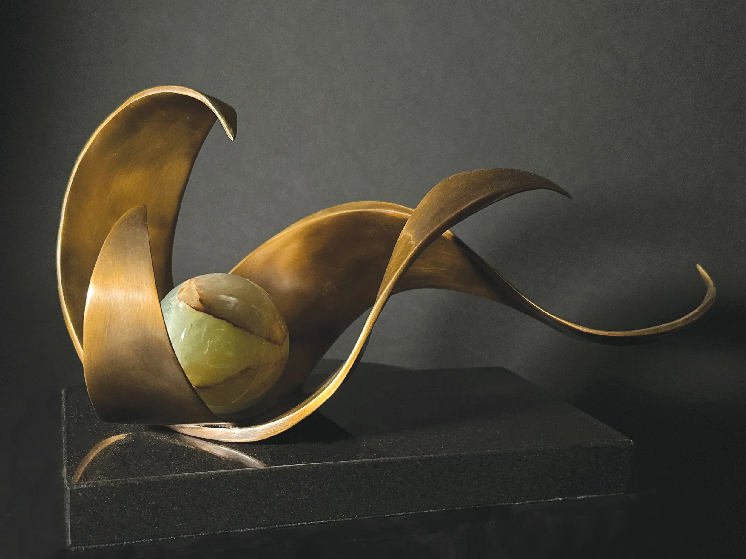 Lynn Dodge l Momentum III l Bronze with black granite base l 6.75” x 12/5” x 5.25"