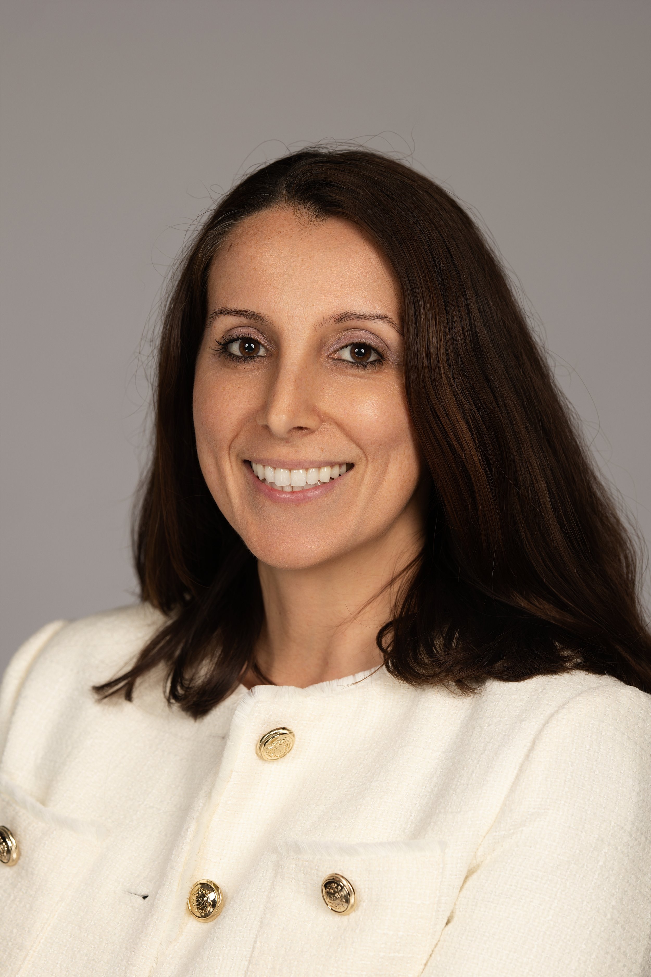 Executive Headshot of Woman in Cream Jacket | Memphis Corporate Photographer
