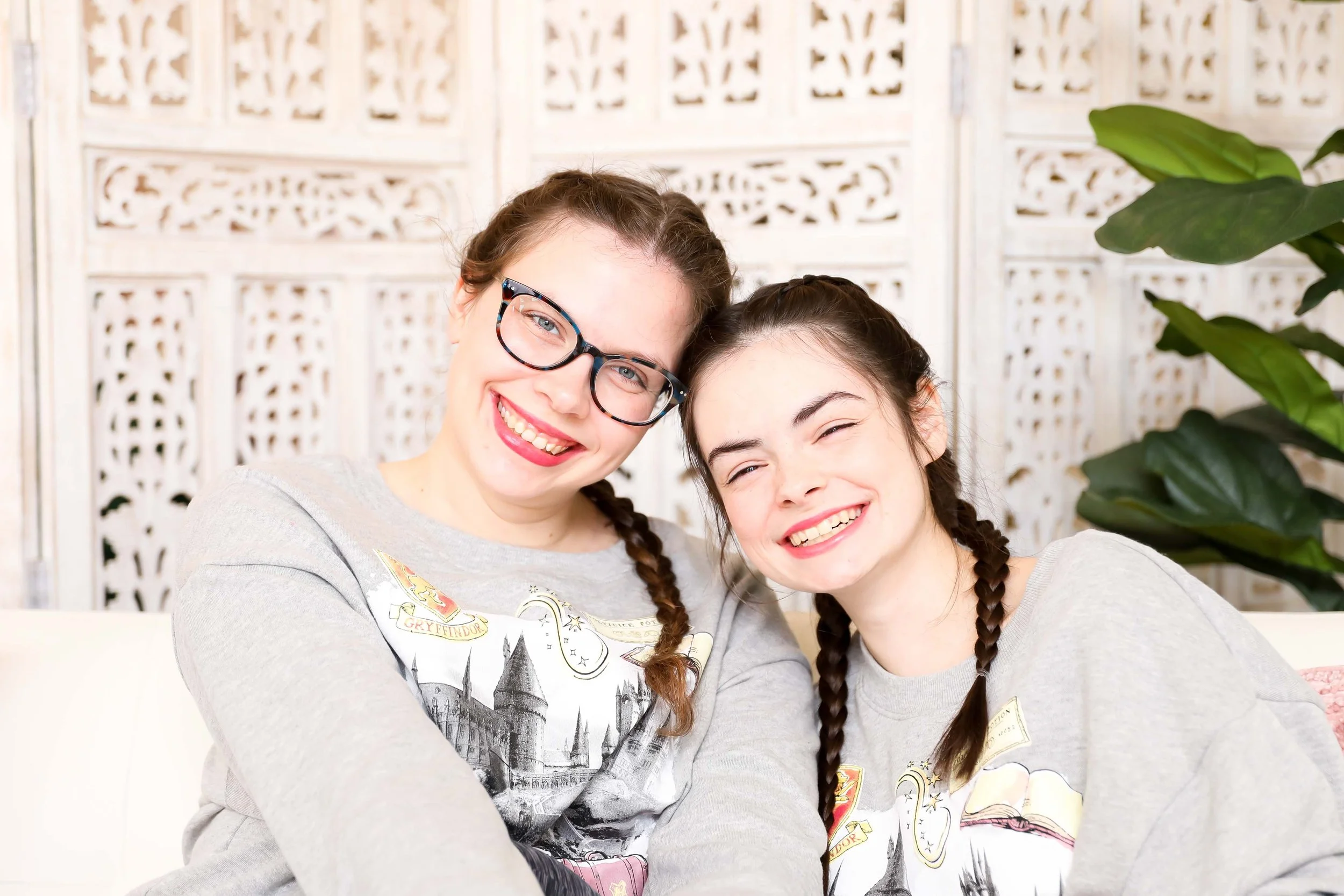 Close up portrait of mother and daughter smiling during senior session at Memphis photography studio
