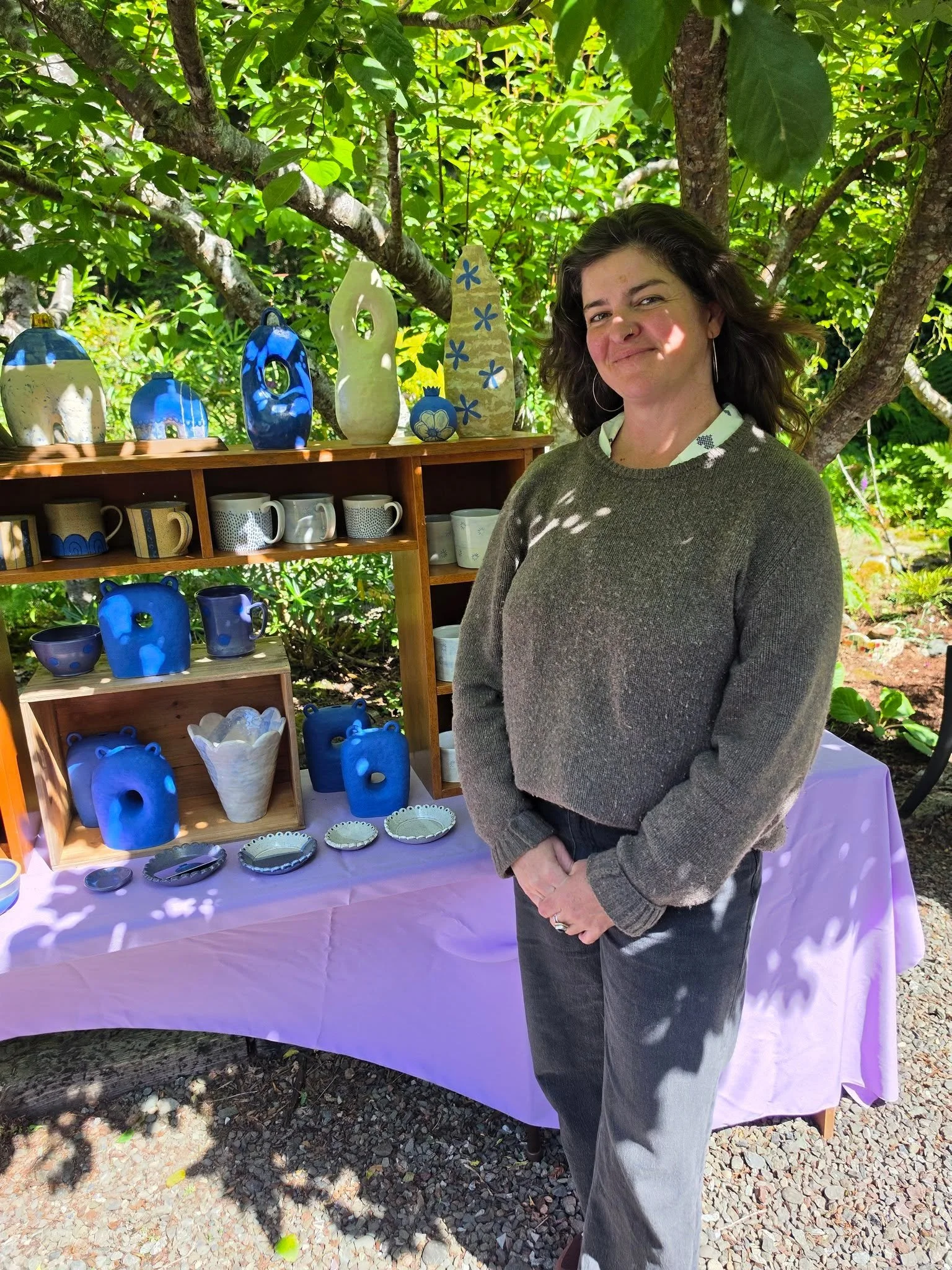 Erin Slattery of Fickle Earth Ceramics had her sun-dappled creations at neighbor JoAnne Berke's house for Weekend 1 of North Coast Open Studios.

NCOS Weekend 2 runs next Saturday and Sunday from 10am to 5pm. Check your local galleries and art-loving