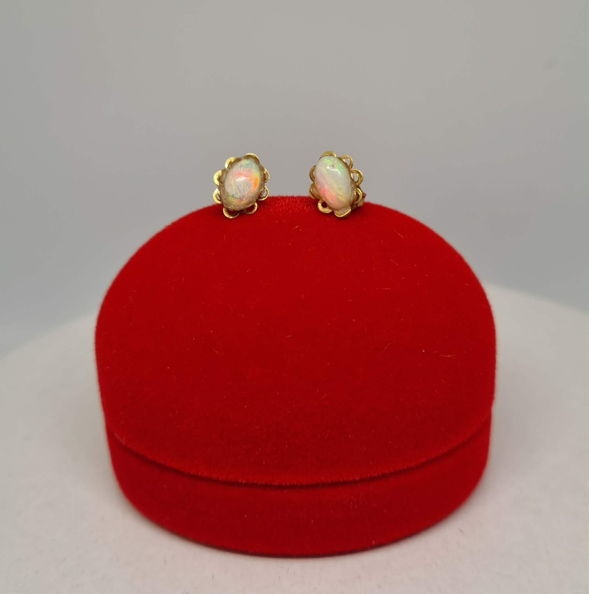 Earrings Australian Solid Opal 9 ct Yellow Gold (Total Weight: 1 gram) Opal Size: 7 mm x 5 mm, 0.7 cm x 0.5 cm