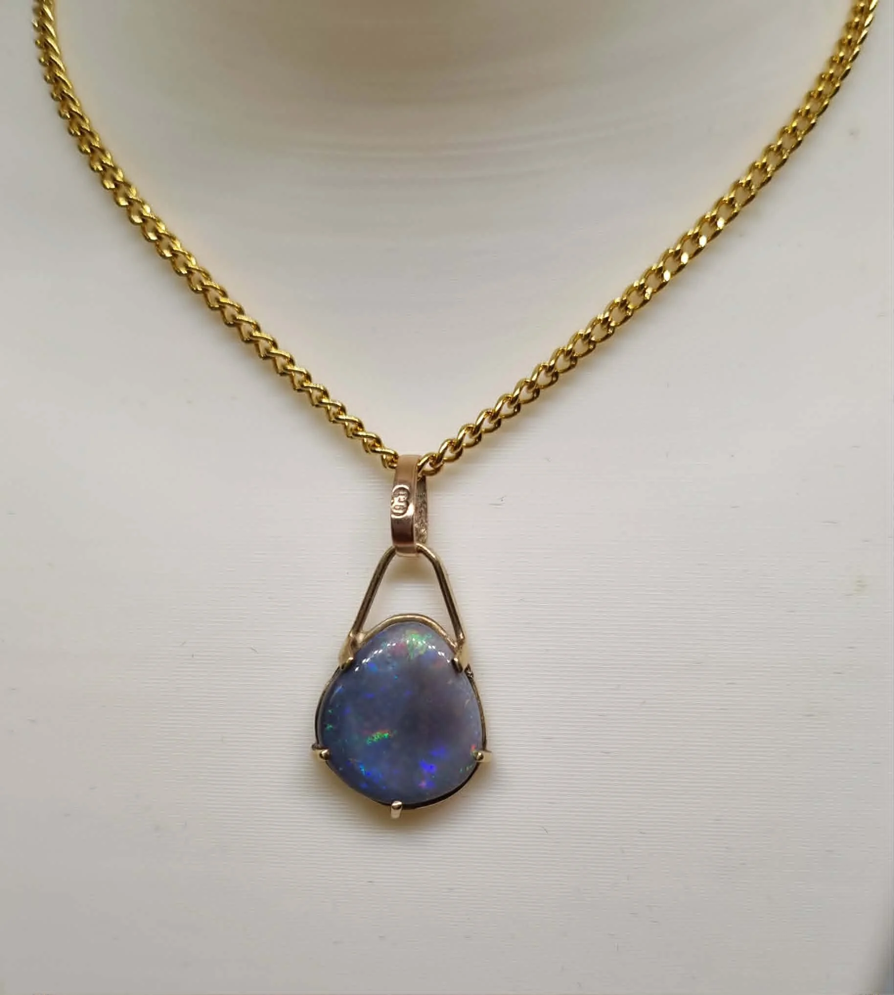 Pendant Australian Solid Black Opal  9 ct  Yellow Gold  (Opal Size: 12 mm x 10 mm,  1.2 cm x 1.0 cm) Total Weight: 1 gram