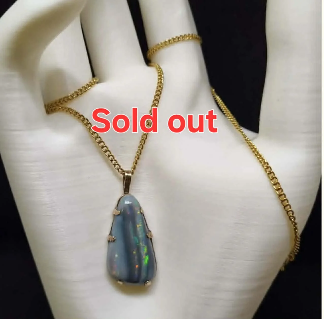 Pendant Australian Semi Black Opal  9 ct Yellow Gold with 9 ct yellow Gold Chain  (Opal Size: 25 mm x 15 mm,  2.5 cm x 1.5 cm)  Total Weight: 2.52 grams