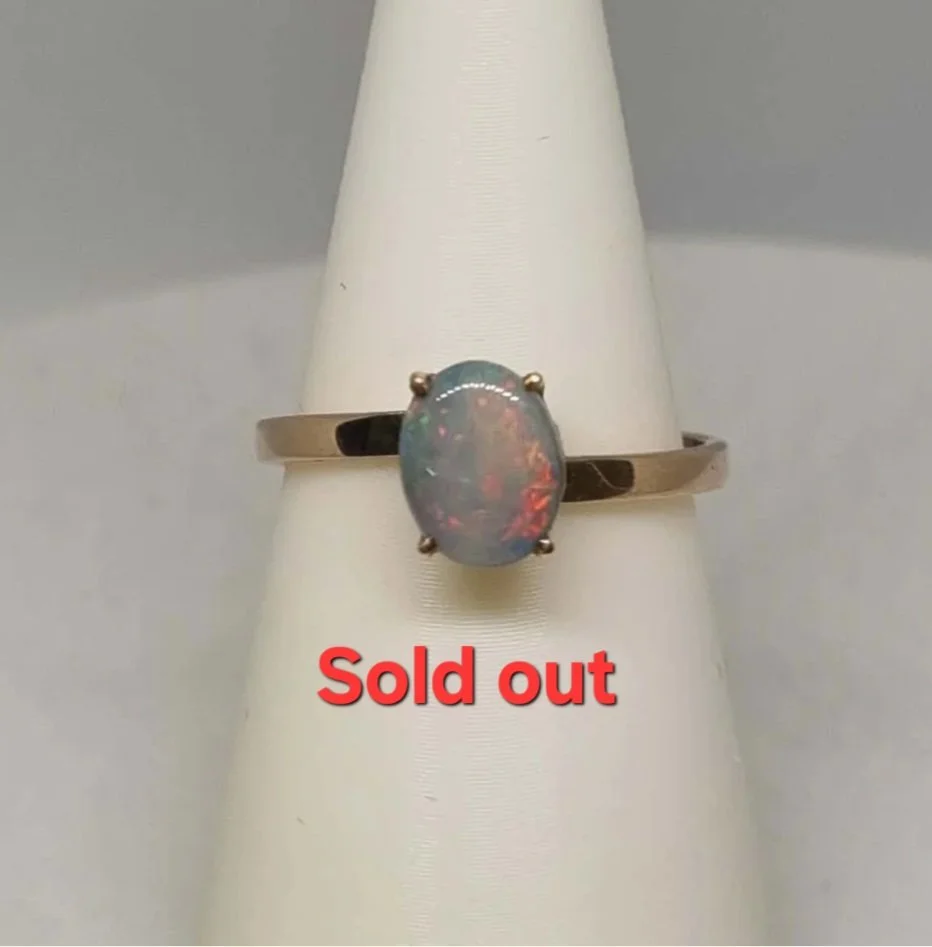 Ring Australian Solid opal 9K Yellow Gold (Opal Size: 8mm x 6mm, 0.8cm x 0.6cm) Total Weight: 1.61 grams Ring Size: 17.3mm, N-7