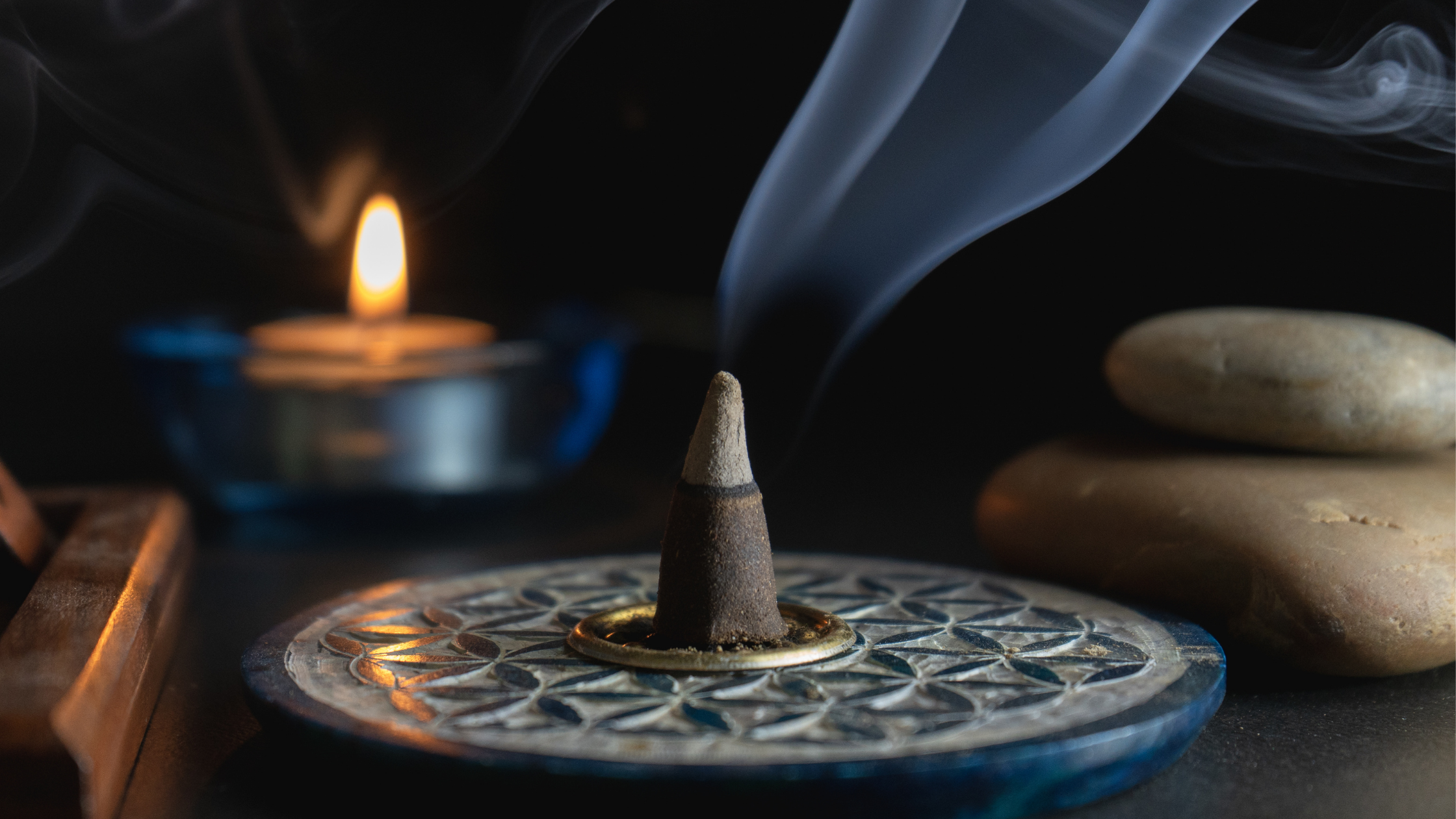   incense cone in a decorative holder  