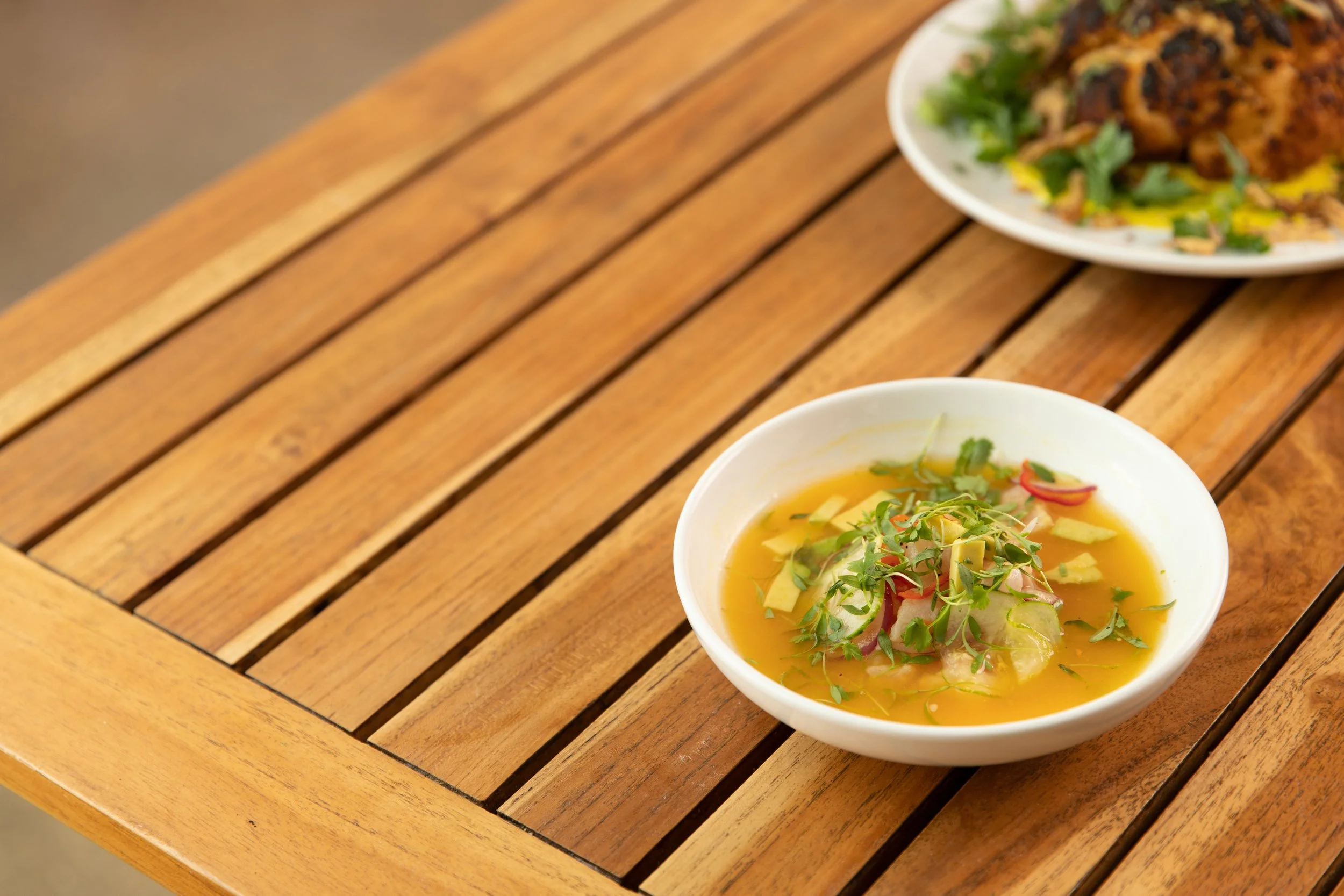 Yellow pepper ceviche with diced peppers and onions