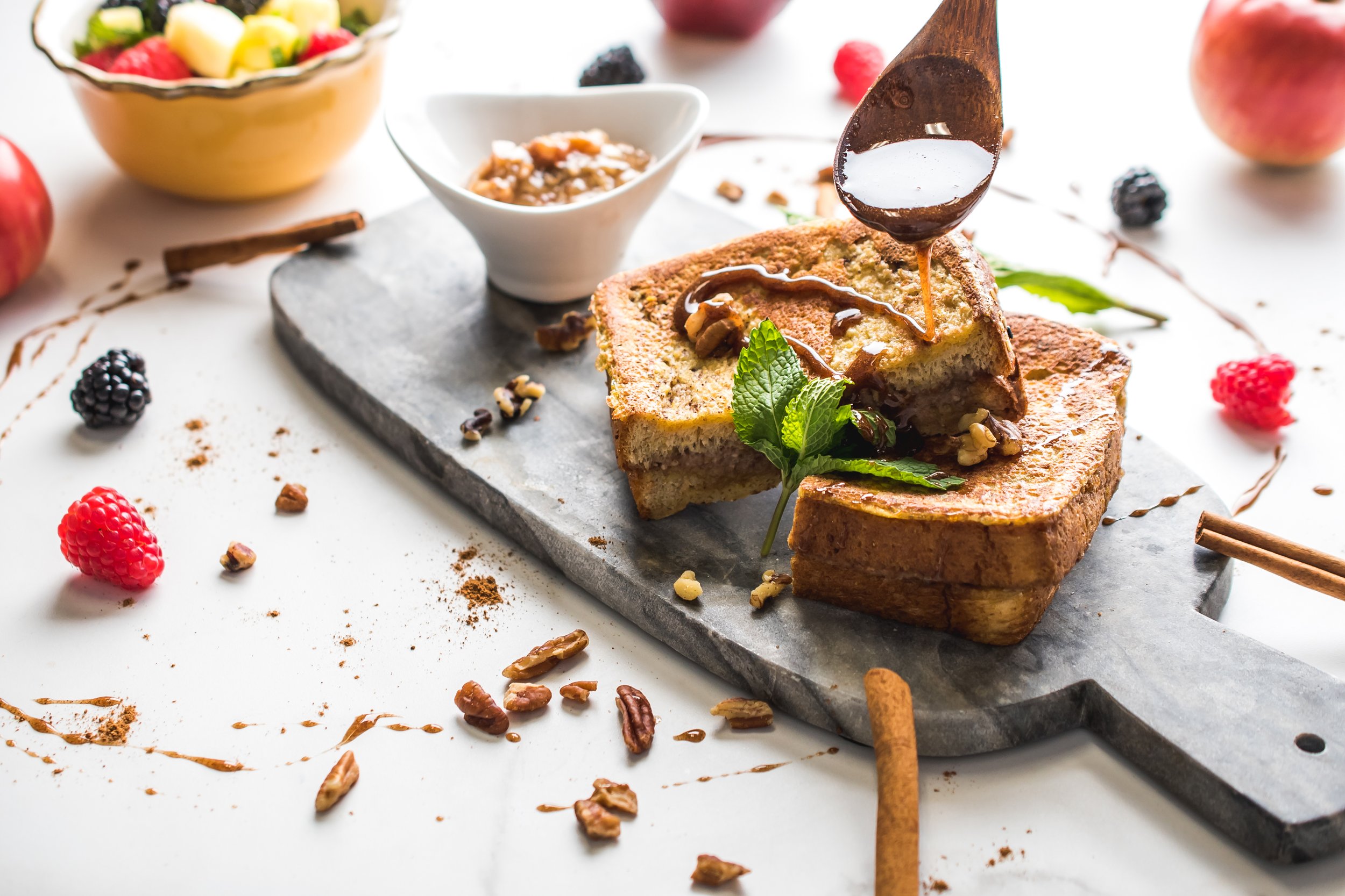  French toast served with pecan syrup.   