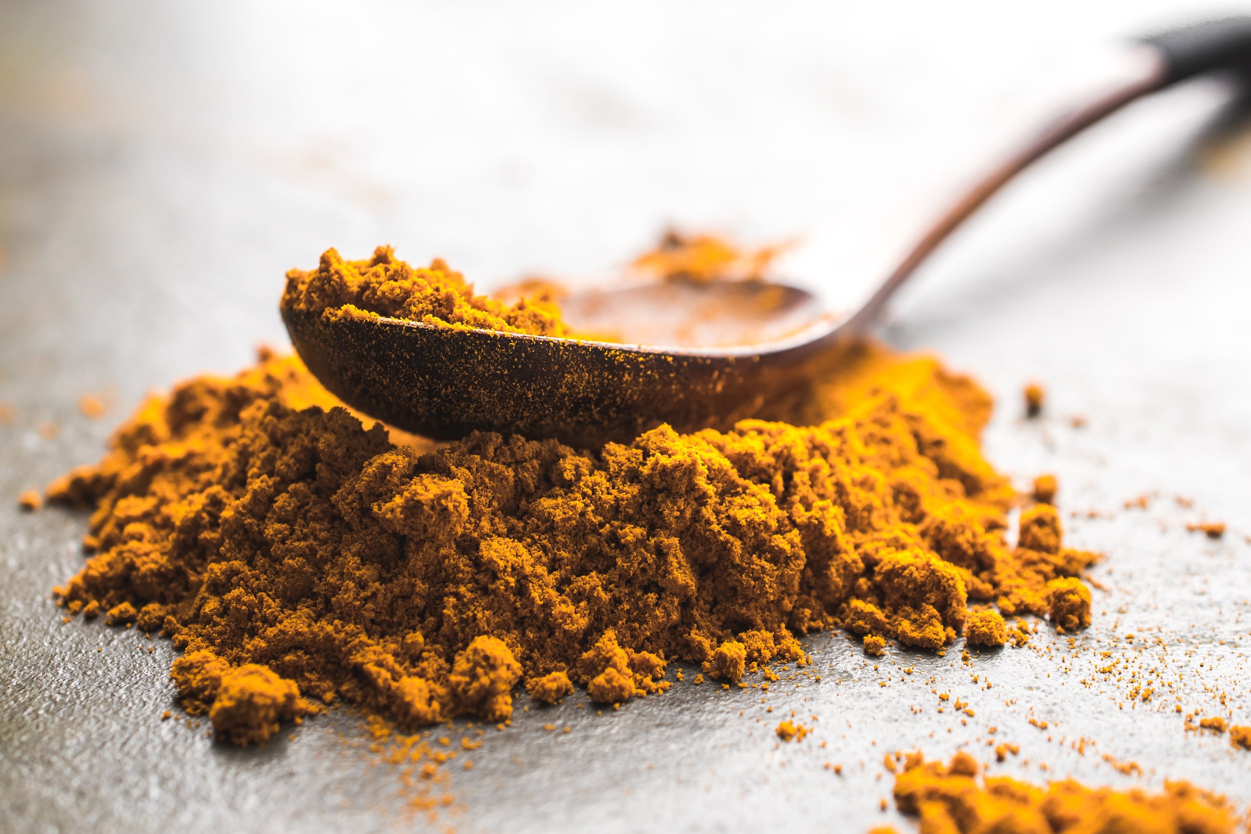  A close-up shot of turmeric spice.   