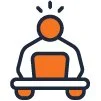 person sitting in front of a laptop at a desk