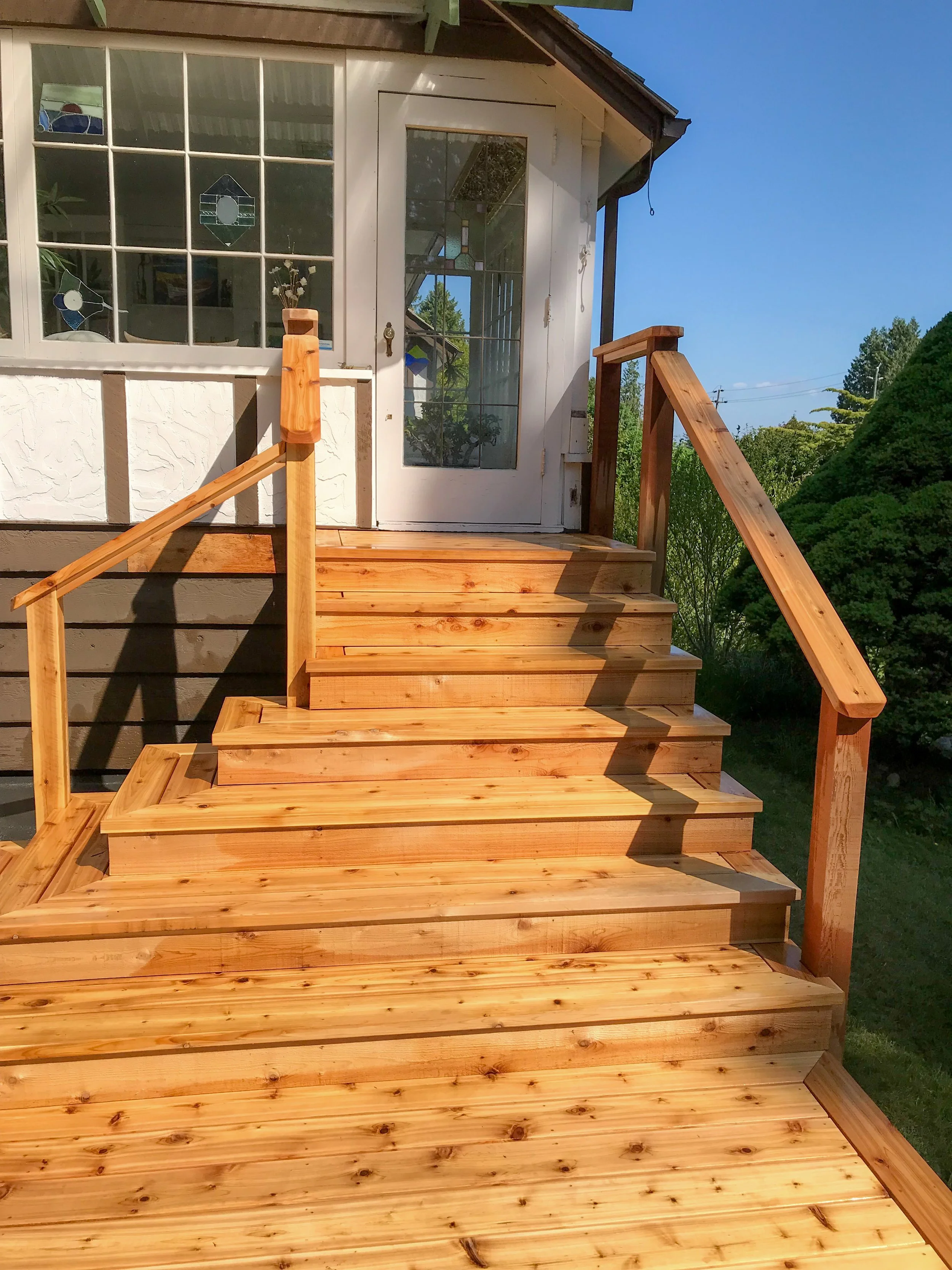Cedar Staircase and Drainage Roof Installation