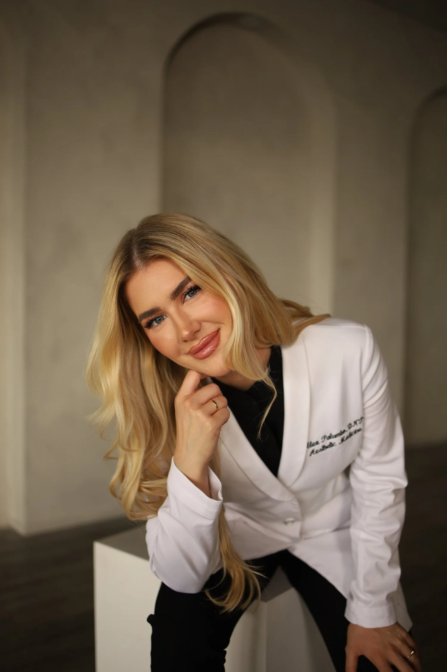 Dr. Alex, DNP, APRN, FNP-C, founder of Blonde Girl Aesthetics