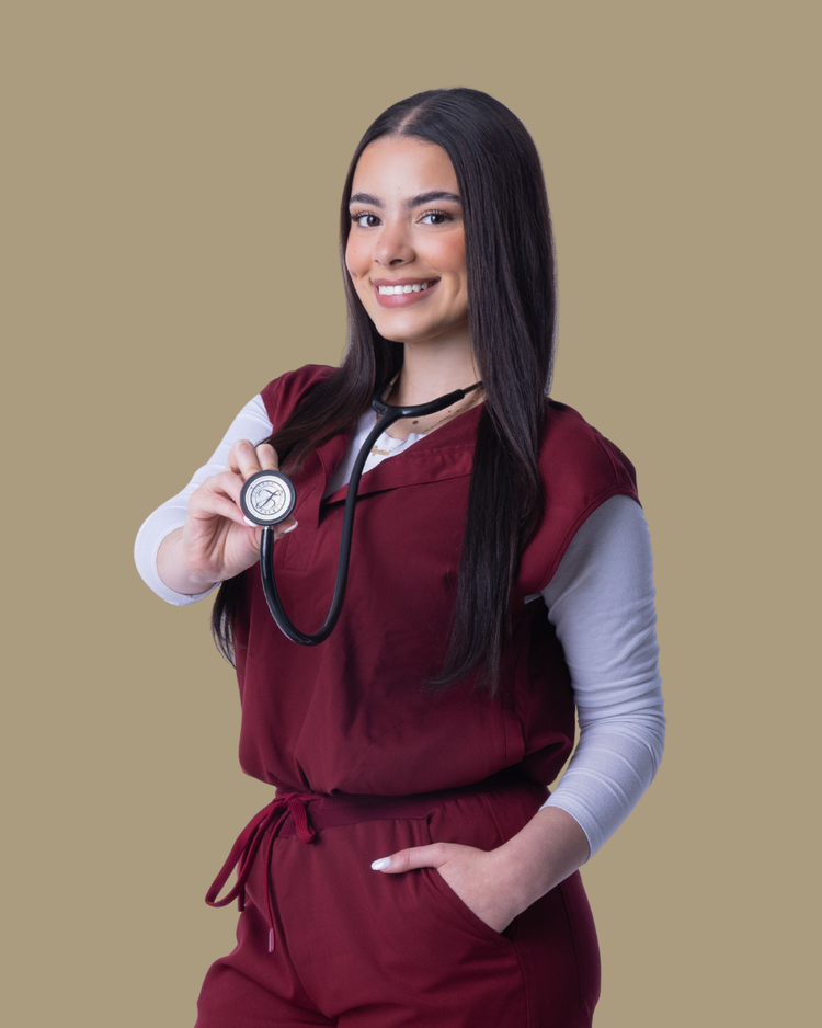 Jetlyane, nurse extern at Blonde Girl Aesthetics, in scrubs with a stethoscope