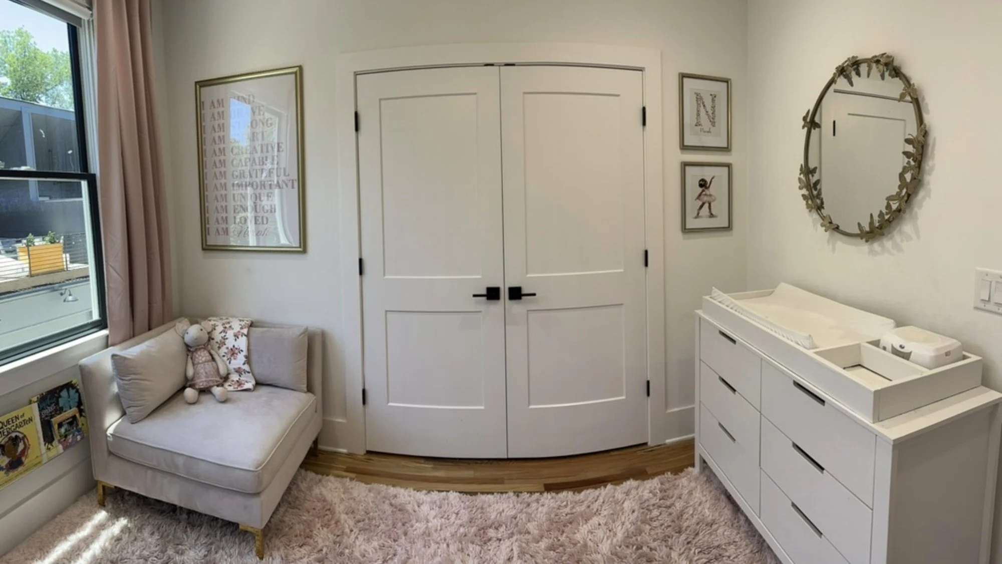 Room in Bloom full nursery reveal with canopy crib, floral mural, and butterfly details