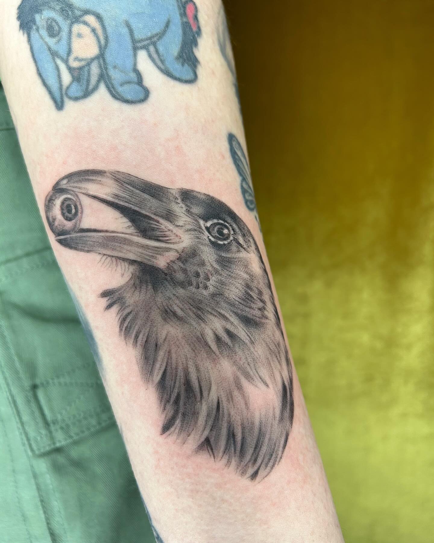 crow 🐦&zwj;⬛ with an eyeball 👁️ for my lovely repeat client, lexi! so excited that i got to tattoo one of my favorite 🤩 flash pieces &amp; super stoked with how it came out. 

#horseface #horsefacetattoo #keepsaketattoopdx #keepsaketattoo #queerta