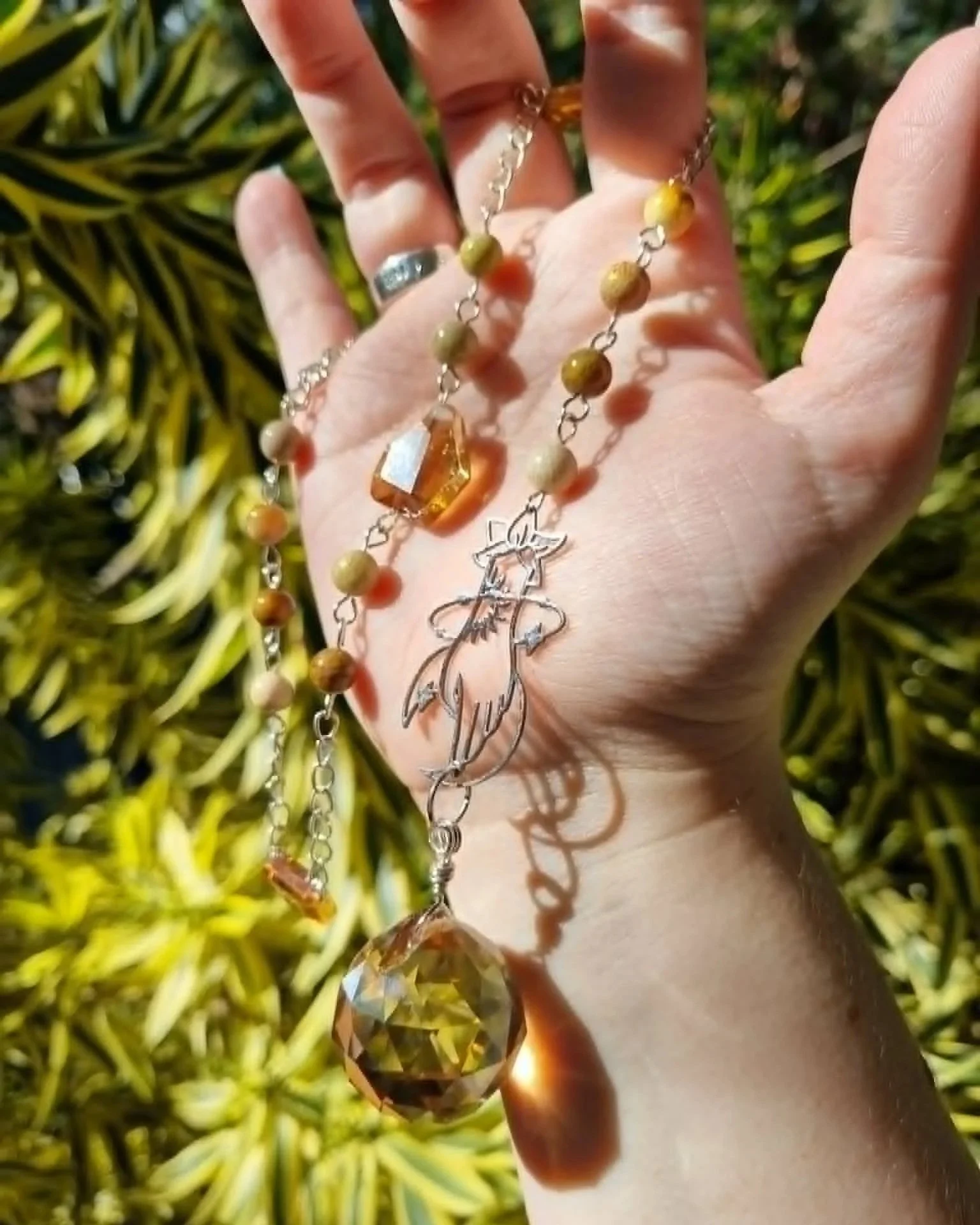 Fossil Jade Hand Sun-Catcher - Silver
