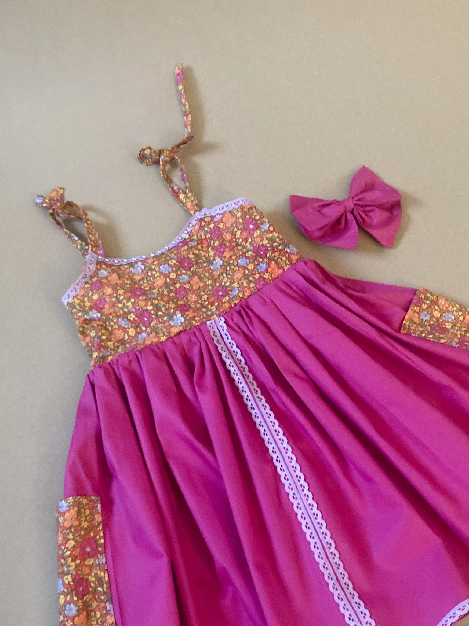 Sustainable child's pink vintage cotton dress with lilac trim & beads