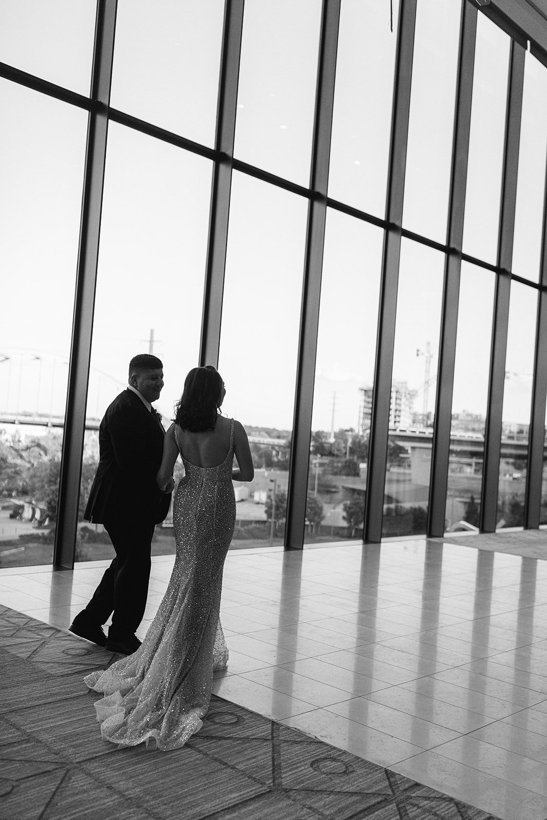 Bride and groom candid portrait during their Four Seasons wedding in Nashville, TN.
