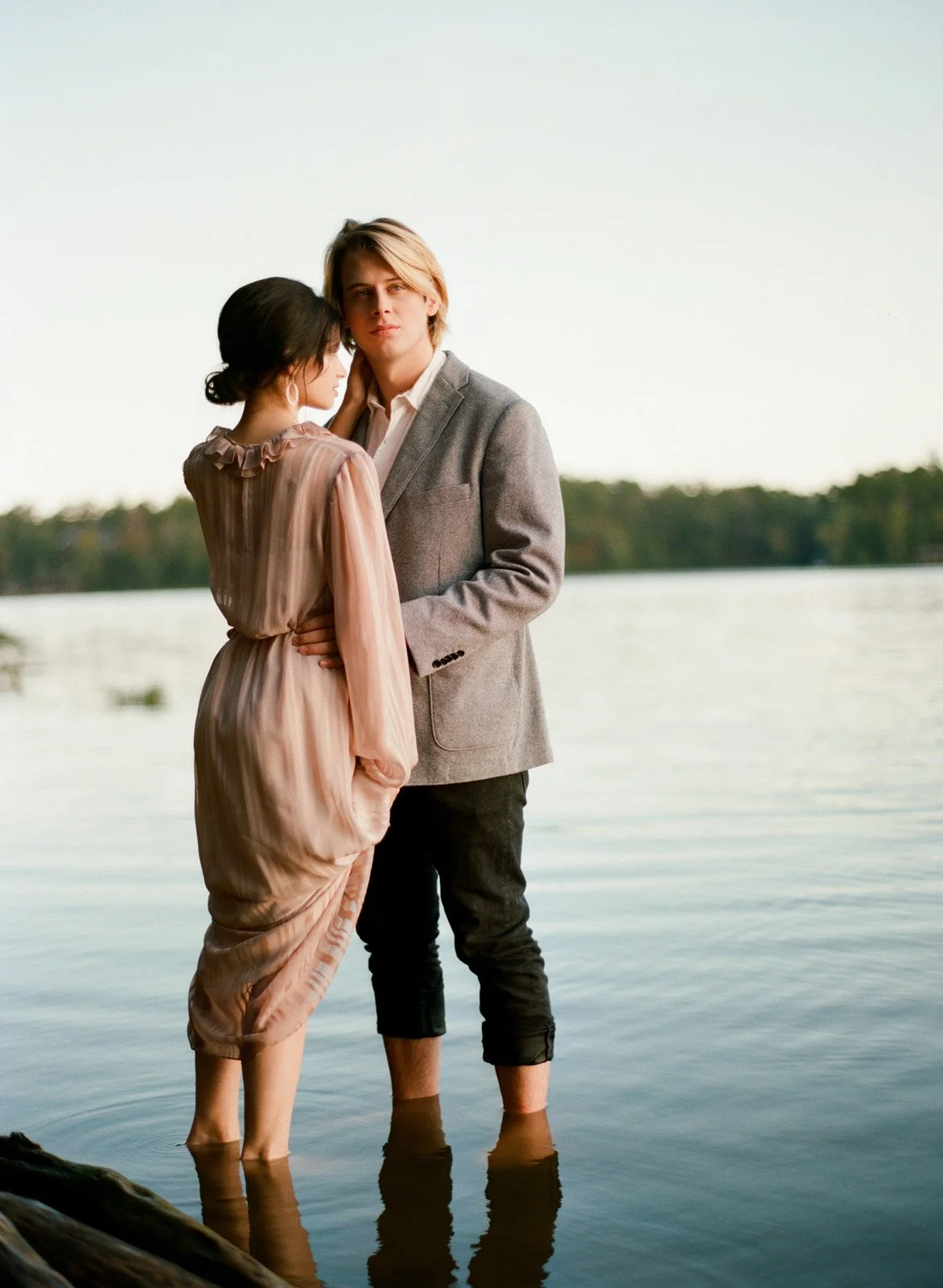 engagement photo of couple standing in water captured by a Tennessee wedding photographer