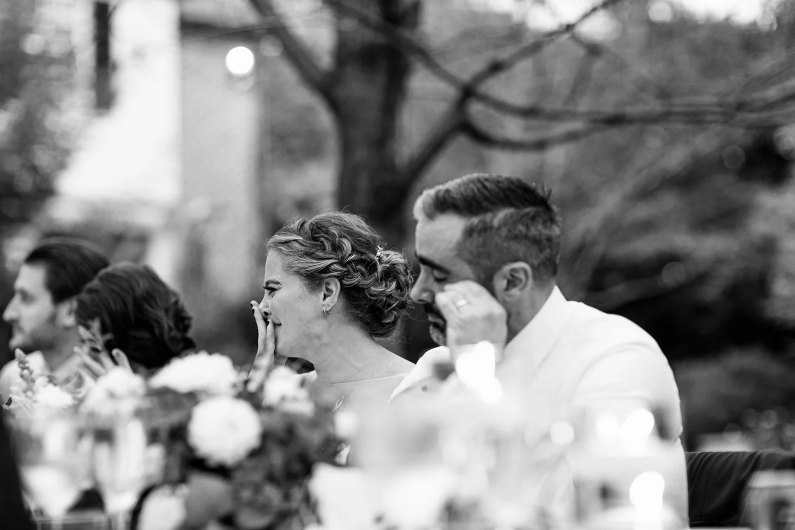 black and white candid photo of reception captured by a Nashville luxury wedding photographer
