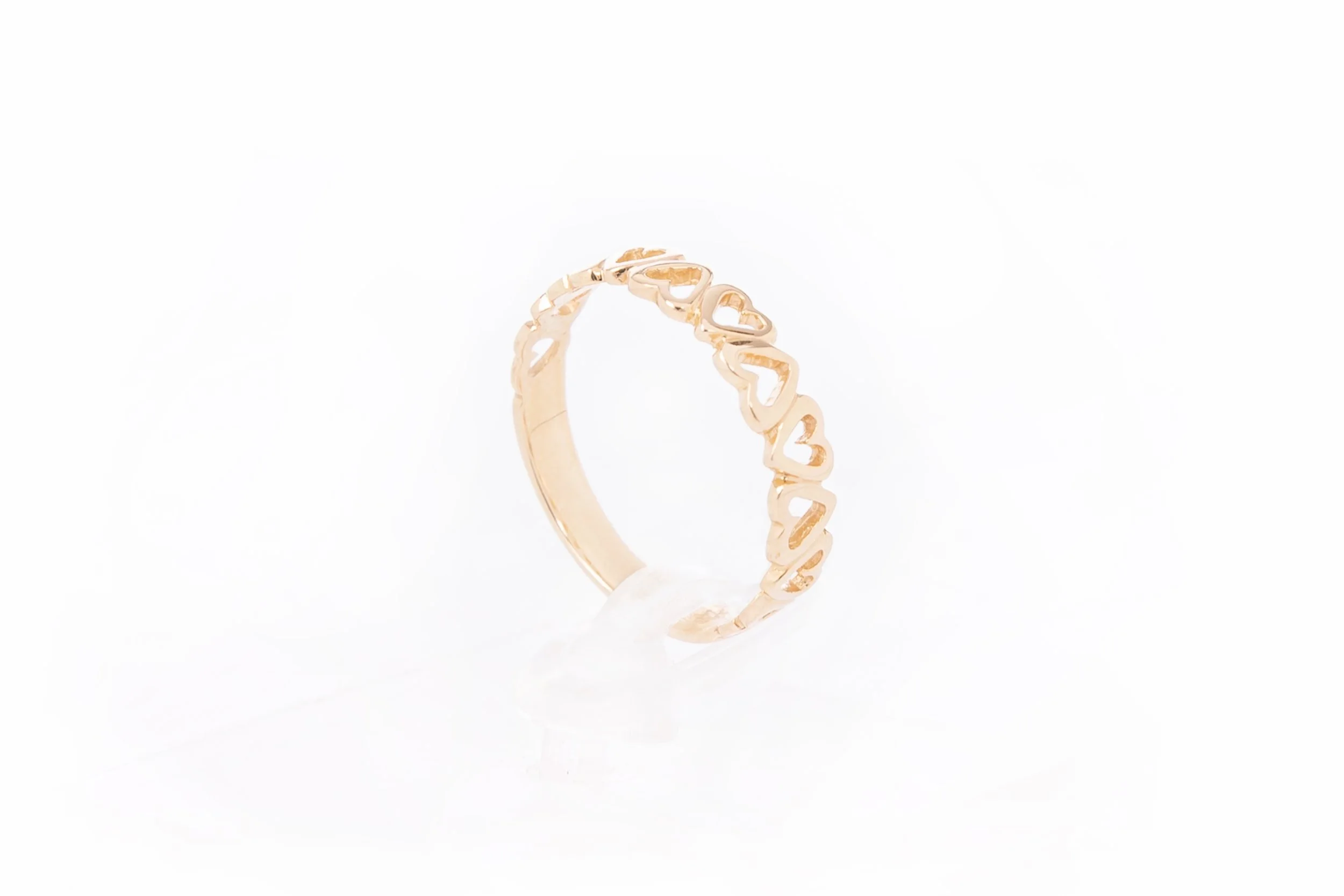 Tumbling Hearts in solid 9ct yellow gold.