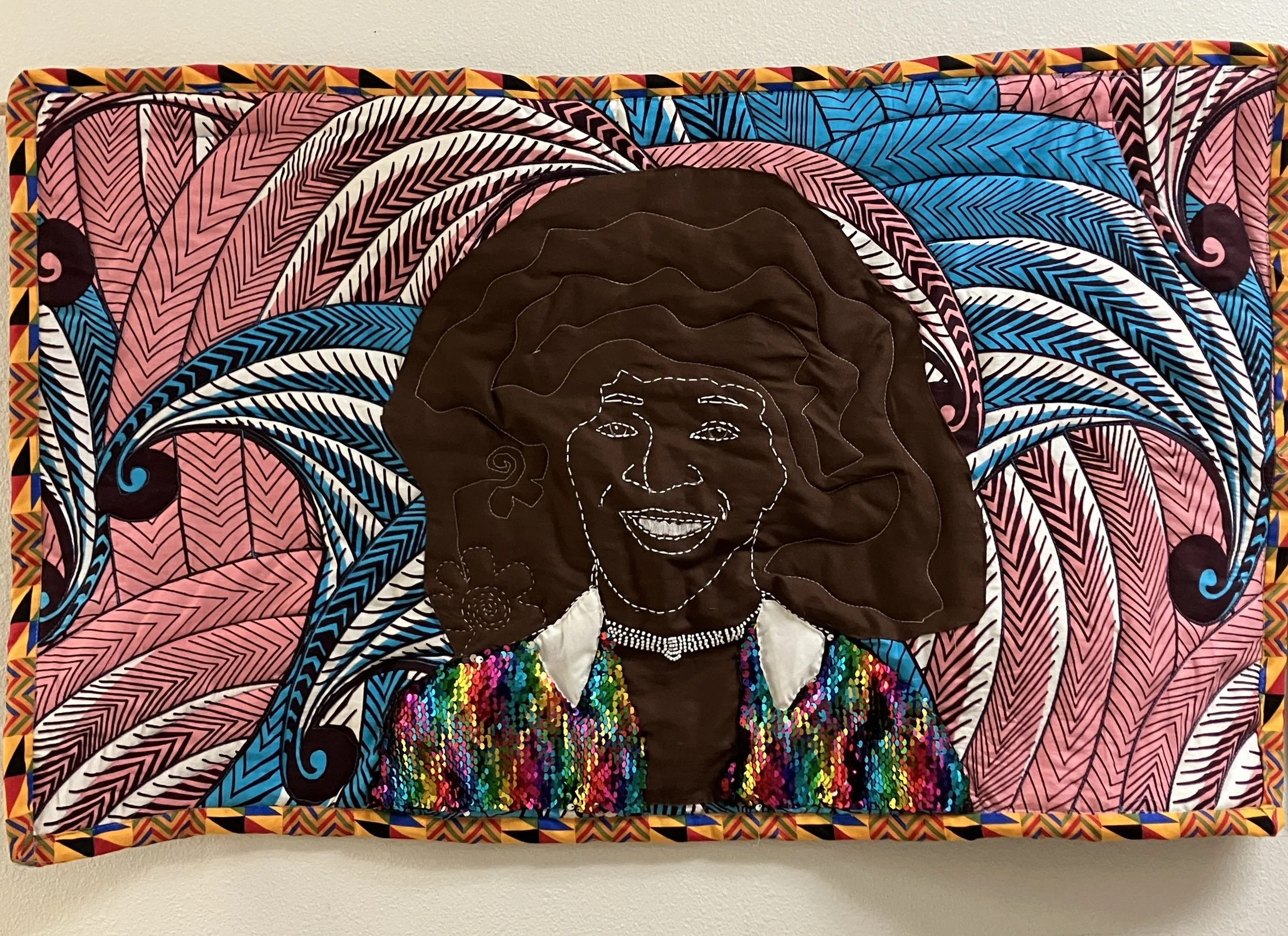 Marsha P Johnson.  Cotton, glass beads, sequins. 24 in x 36 in. 2025. 