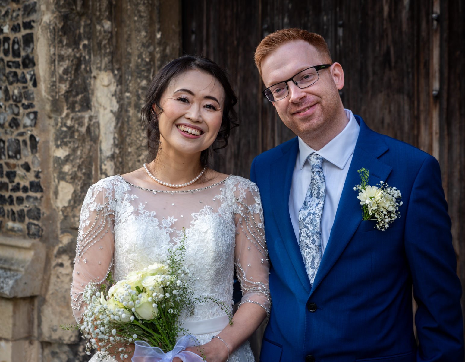 stowmarket-church-bride-groom smiling.jpg