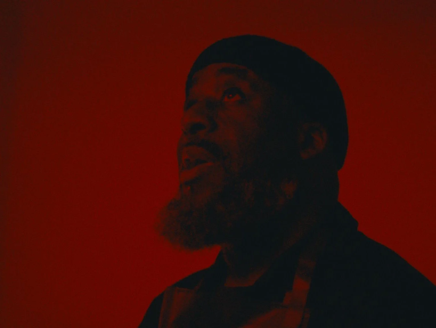 AJAMU X, HOLDING THE FRAME