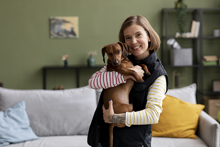 close-up-woman-hugging-her-pet-dog copy.png