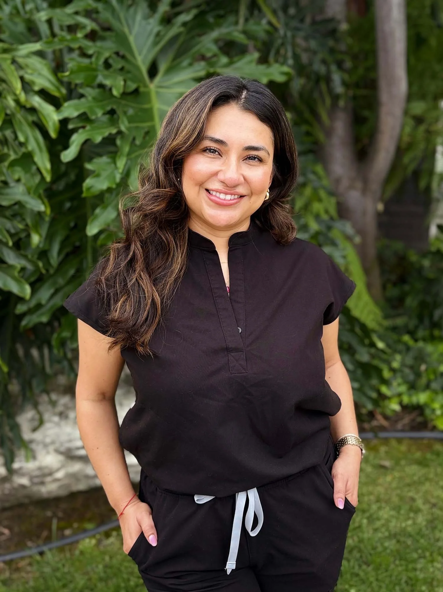 Professional headshot of Roslyn, Ayamluz Wellness Care Coordinator, smiling