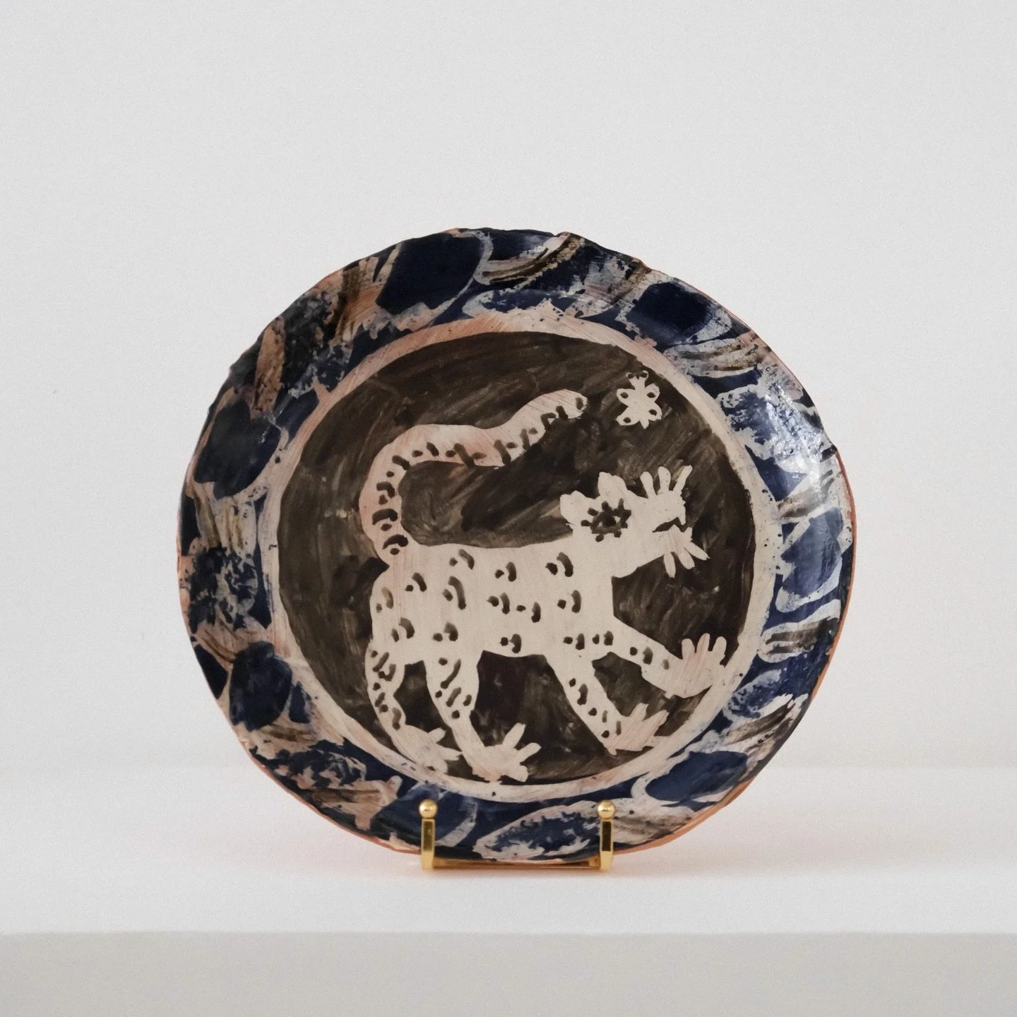 Beautiful Terracotta clay plates, decorated with white slip, cobalt and iron oxide and clear glaze. 

Amabel&rsquo;s fantastic ceramic plates would look perfect adorning a kitchen dresser or hung on the wall as a piece of art.

We absolutely love her
