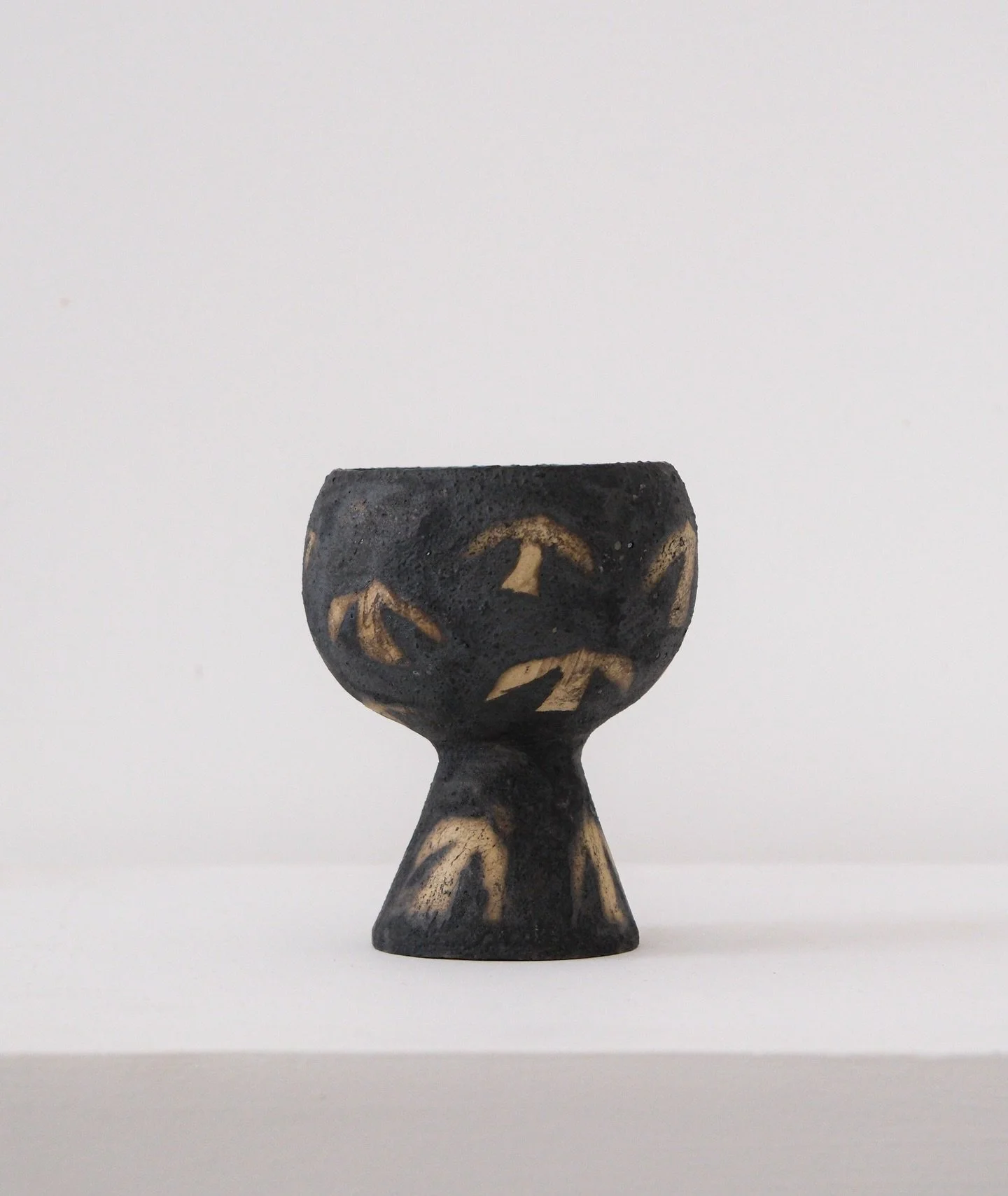 Sacred Ceremonial Goblet By Sophie Wake
2026

Hand built stoneware ceramic with black copper&nbsp;oxide, sandblasted

H:13 cm x W:10 cm

For more information contact 
Caroline@milieustudios.co.uk