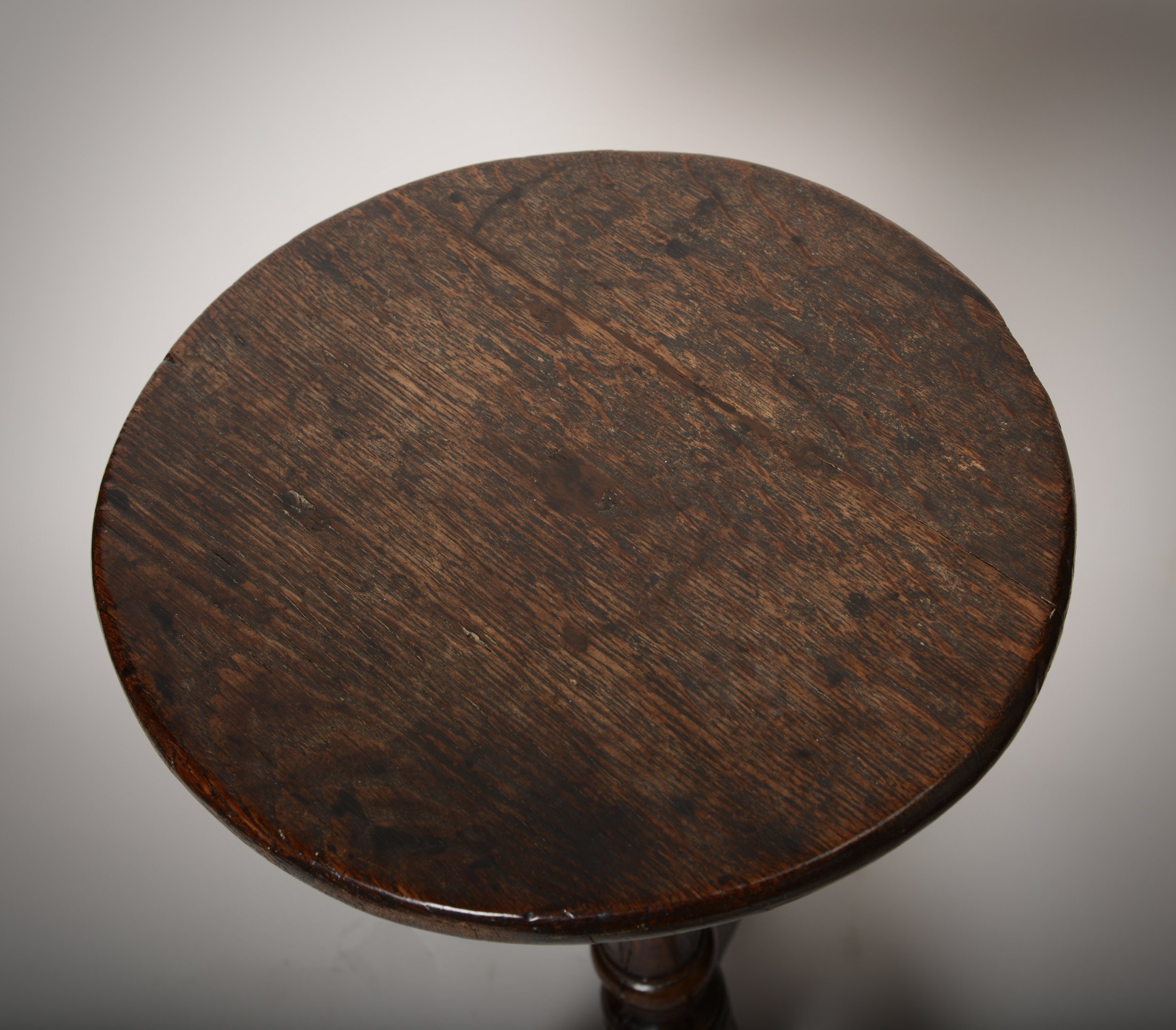 Early C18th oak candle stand