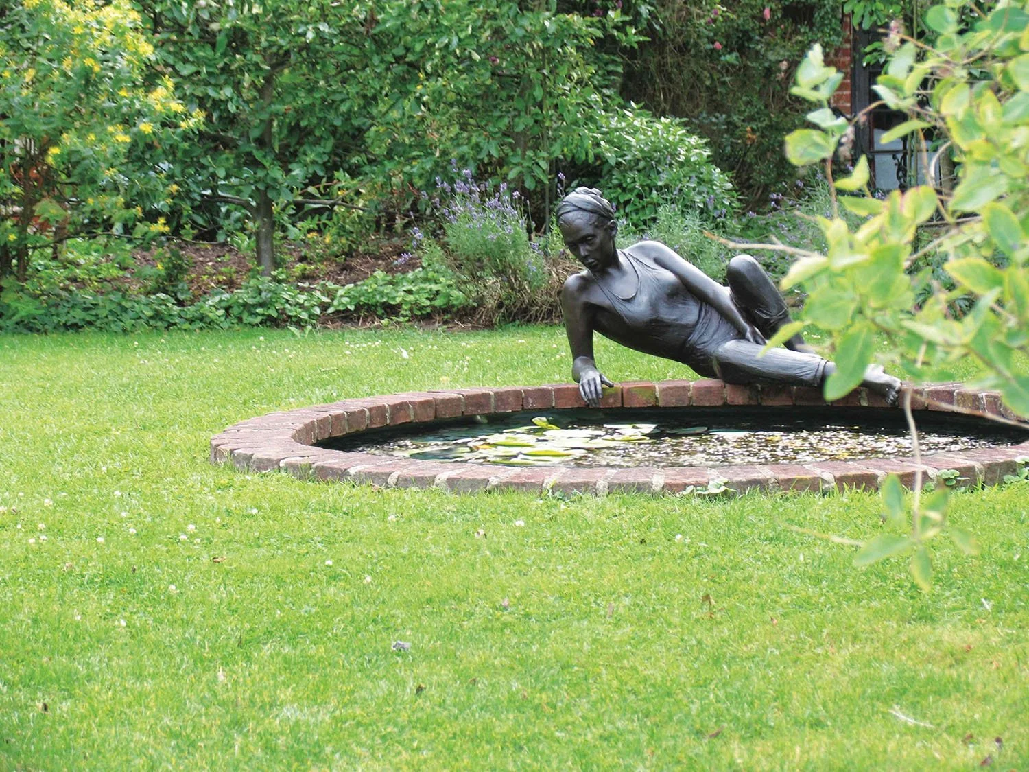 bronze-sculpture-young-woman-reclining-v1.jpg