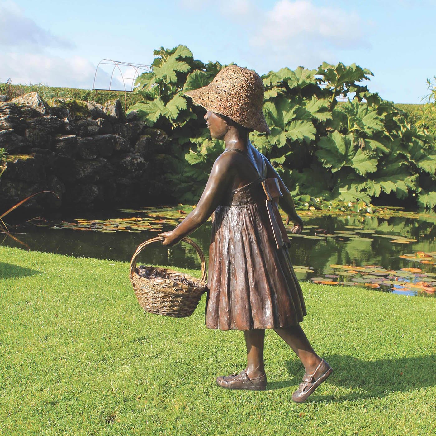 bronze-sculpture-child-with-fruit-basket-01.jpg
